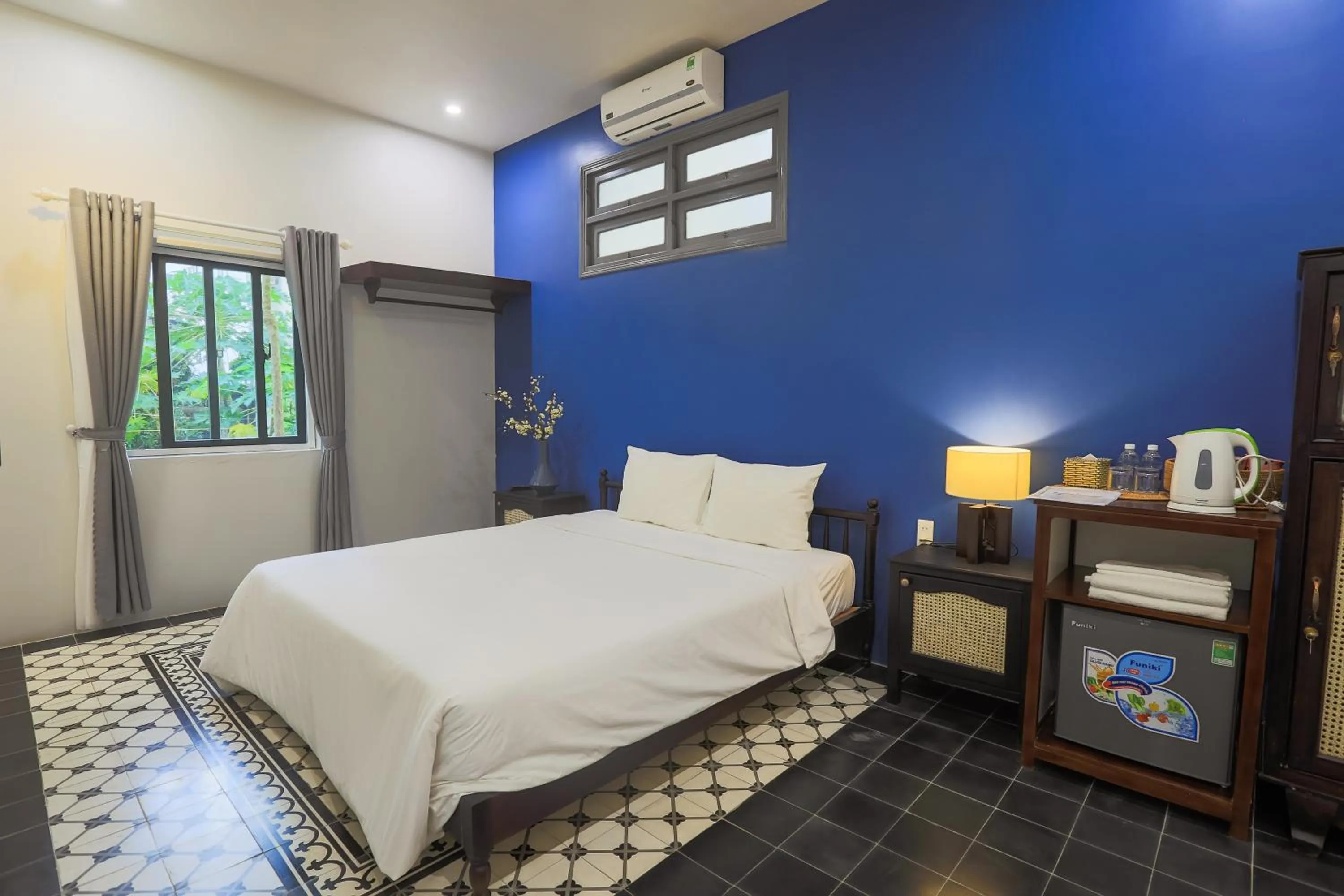 Bed in Thi Boutique Villa