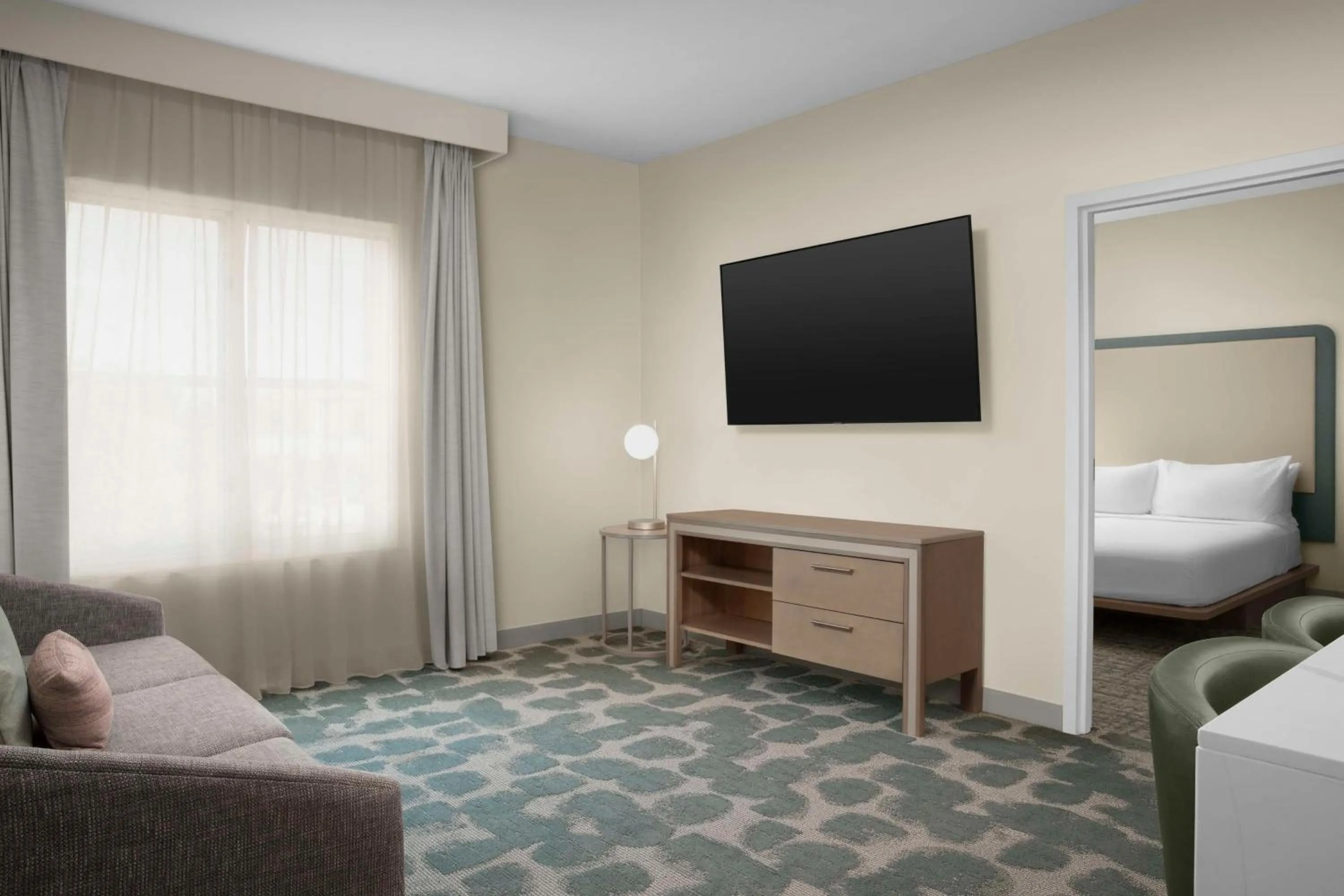 Living room, Bed in Homewood Suites by Hilton Irving-DFW Airport