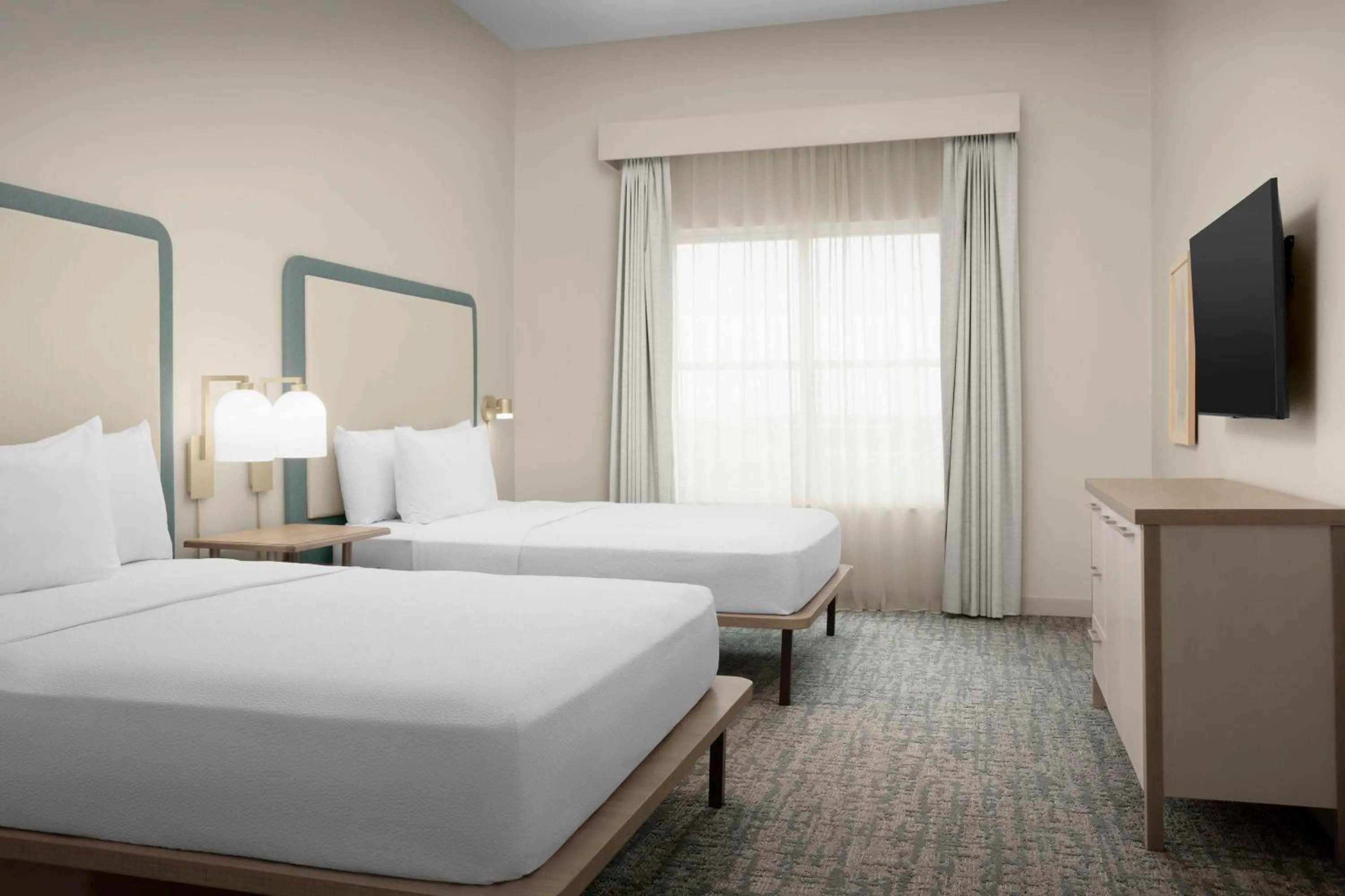 Bed in Homewood Suites by Hilton Irving-DFW Airport