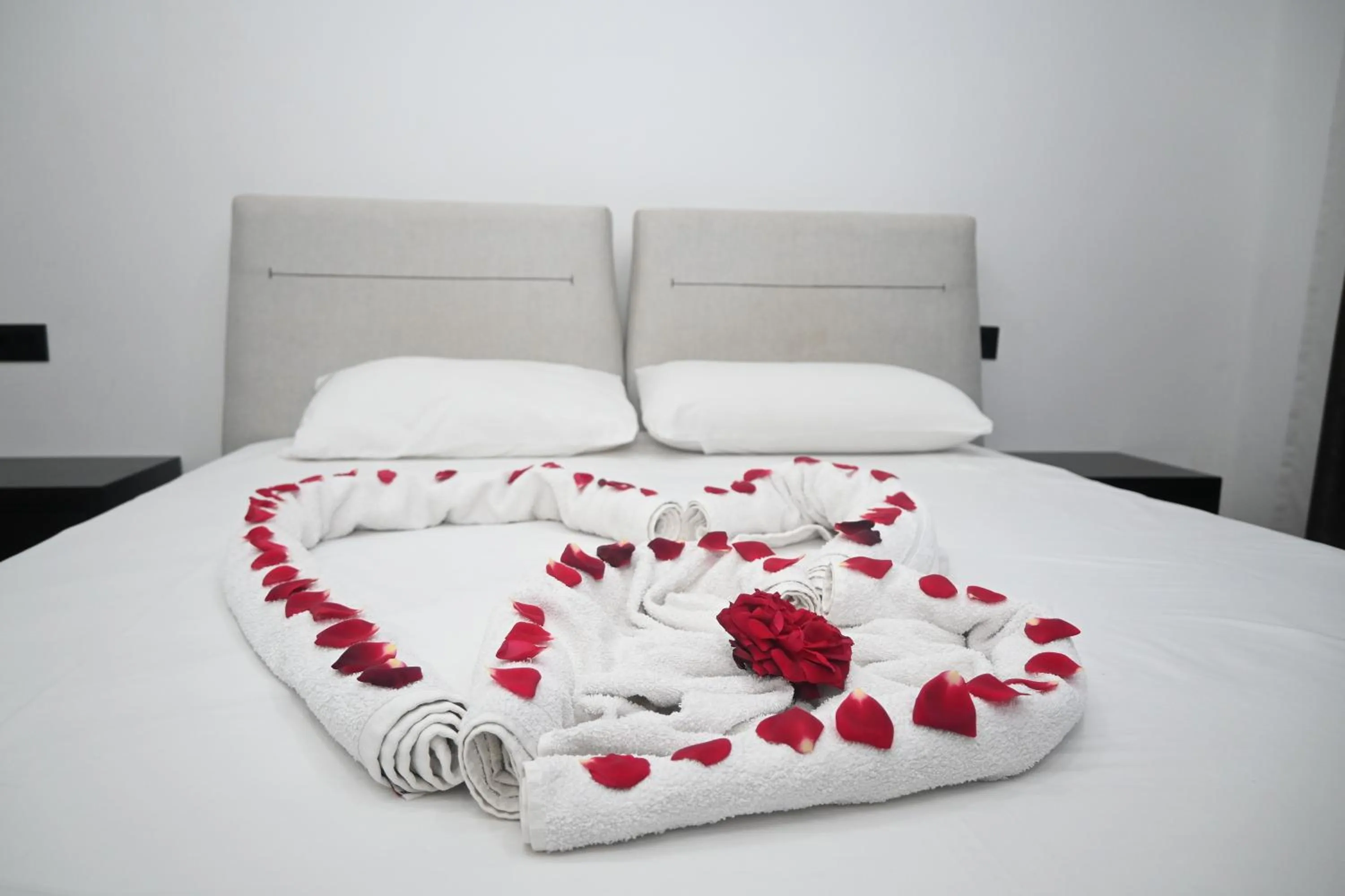 Bed in Lux Apartments