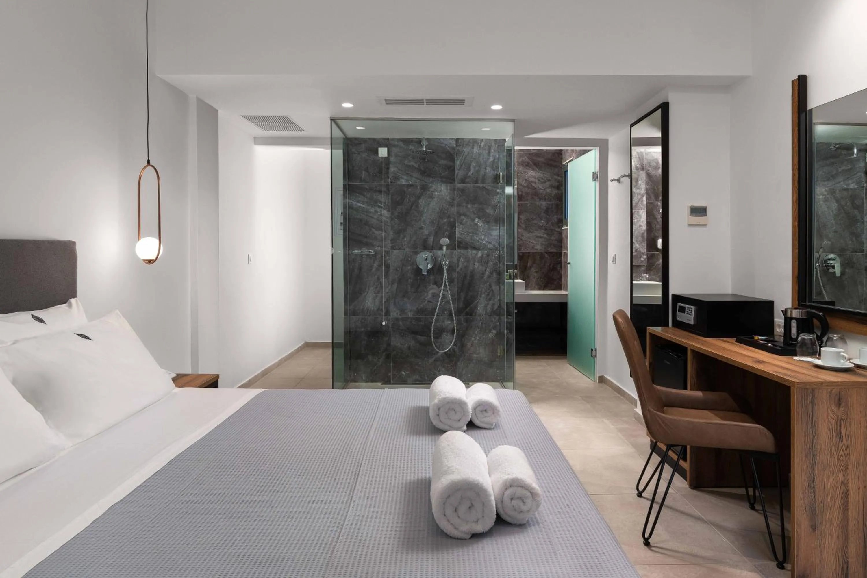 Photo of the whole room, Bed in Atalanti Boutique Hotel - Adults Only