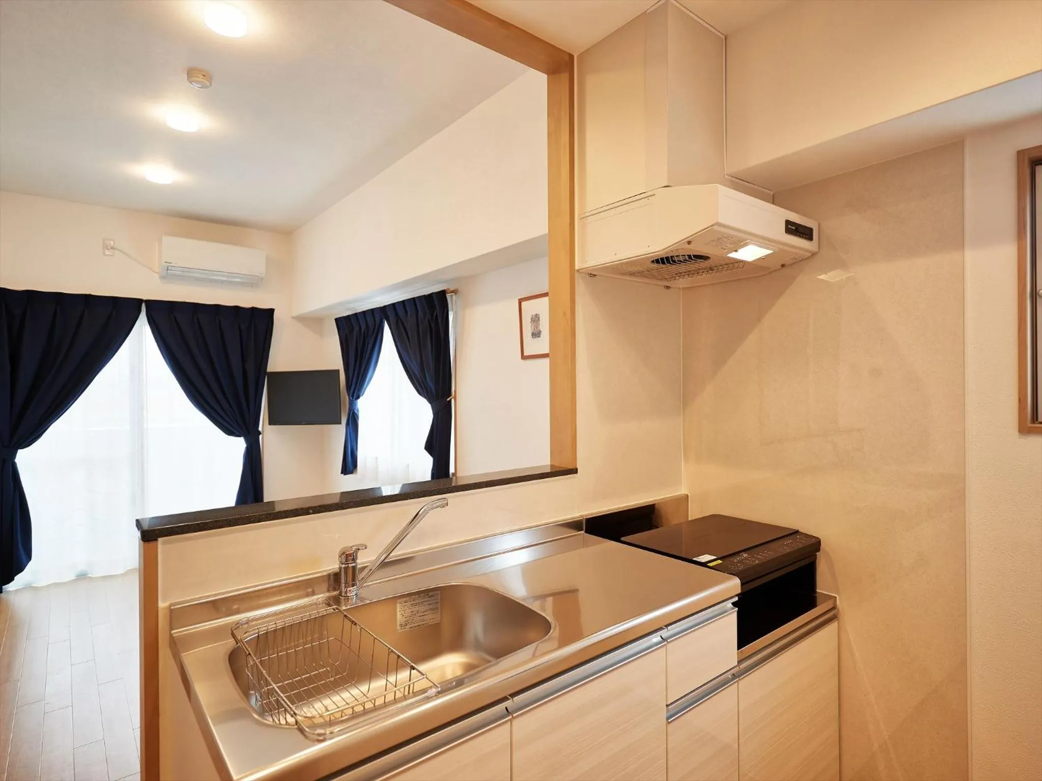 Kitchen or kitchenette in M´s Stay Okinawa