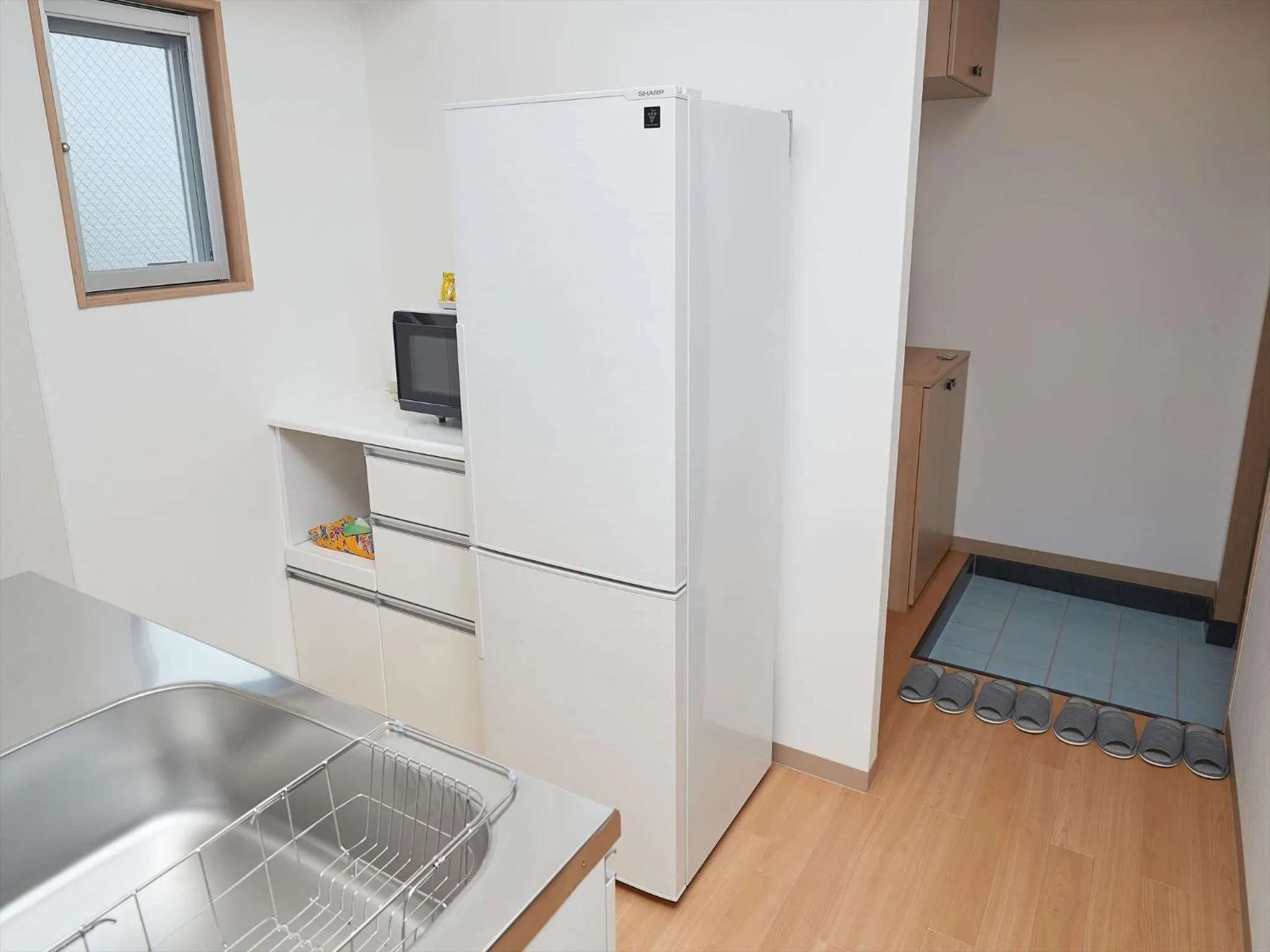 Kitchen or kitchenette in M´s Stay Okinawa