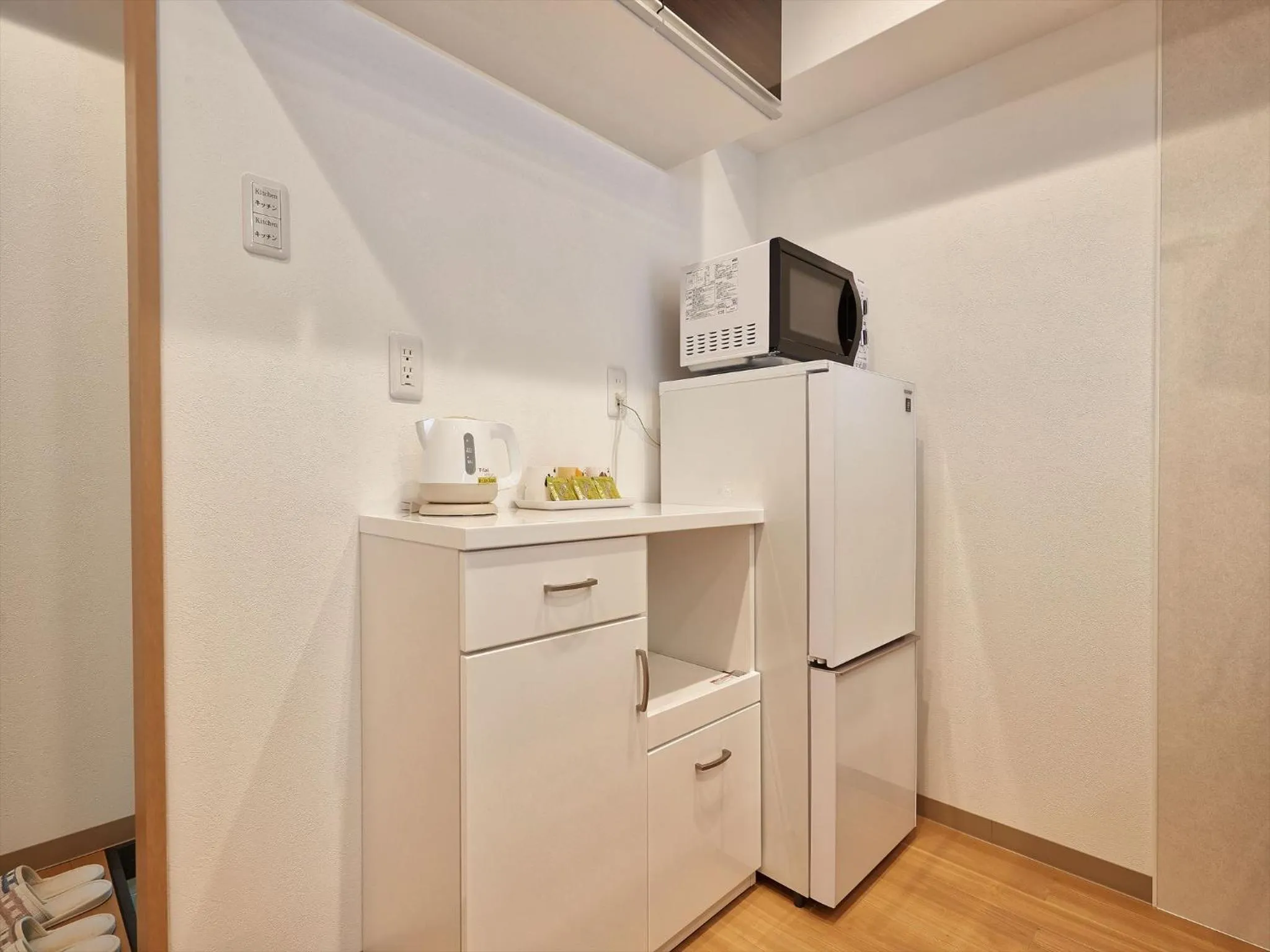 Kitchen or kitchenette in M´s Stay Okinawa