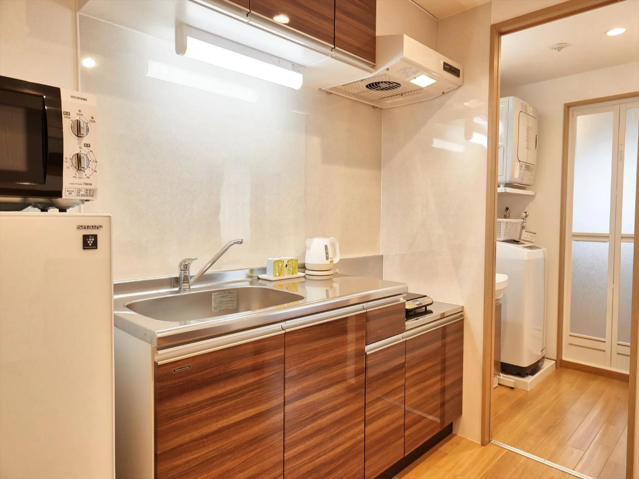 Kitchen or kitchenette in M´s Stay Okinawa