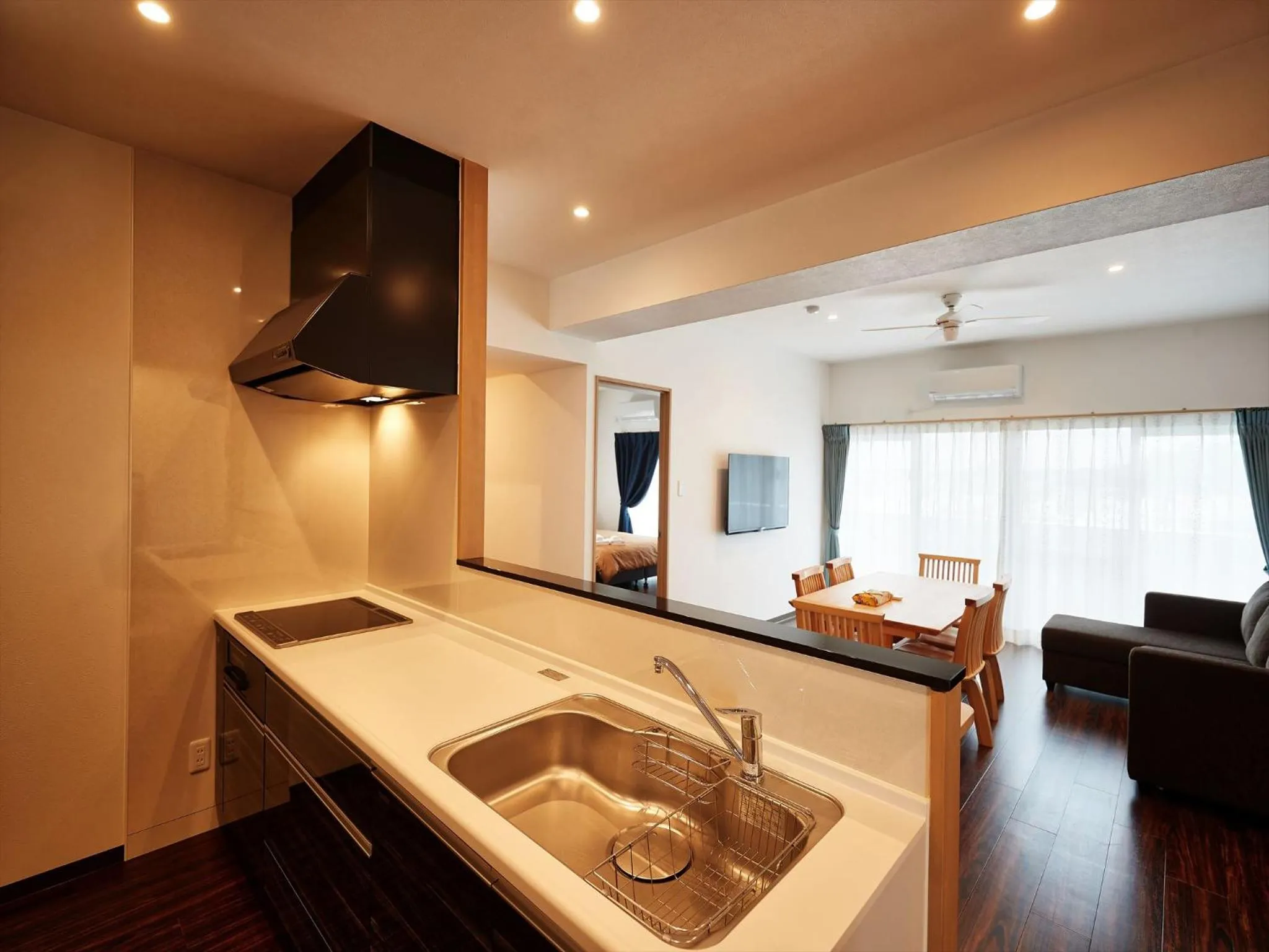 Kitchen or kitchenette in M´s Stay Okinawa