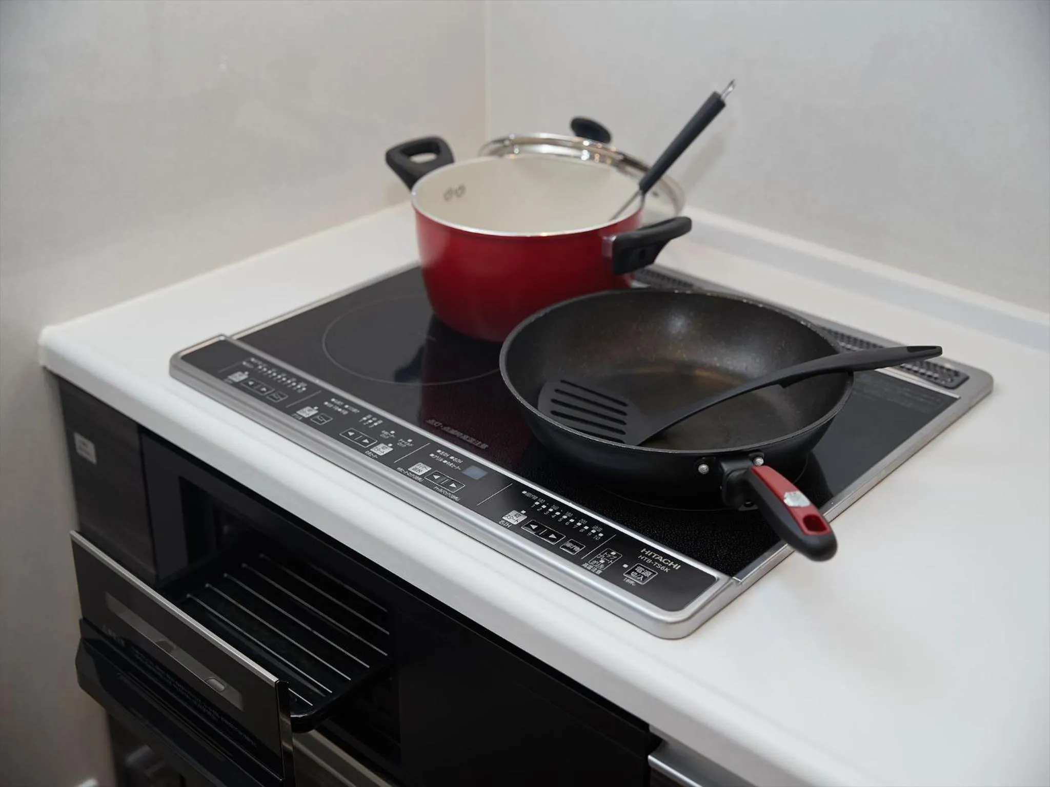 Kitchen or kitchenette in M´s Stay Okinawa