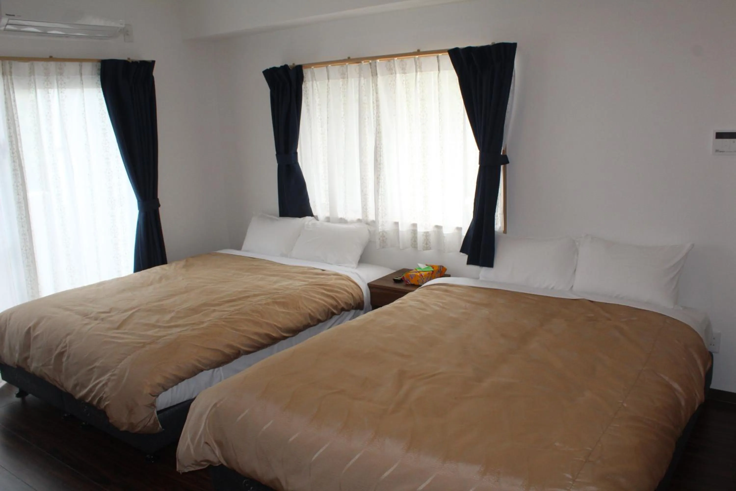 Bed in M´s Stay Okinawa