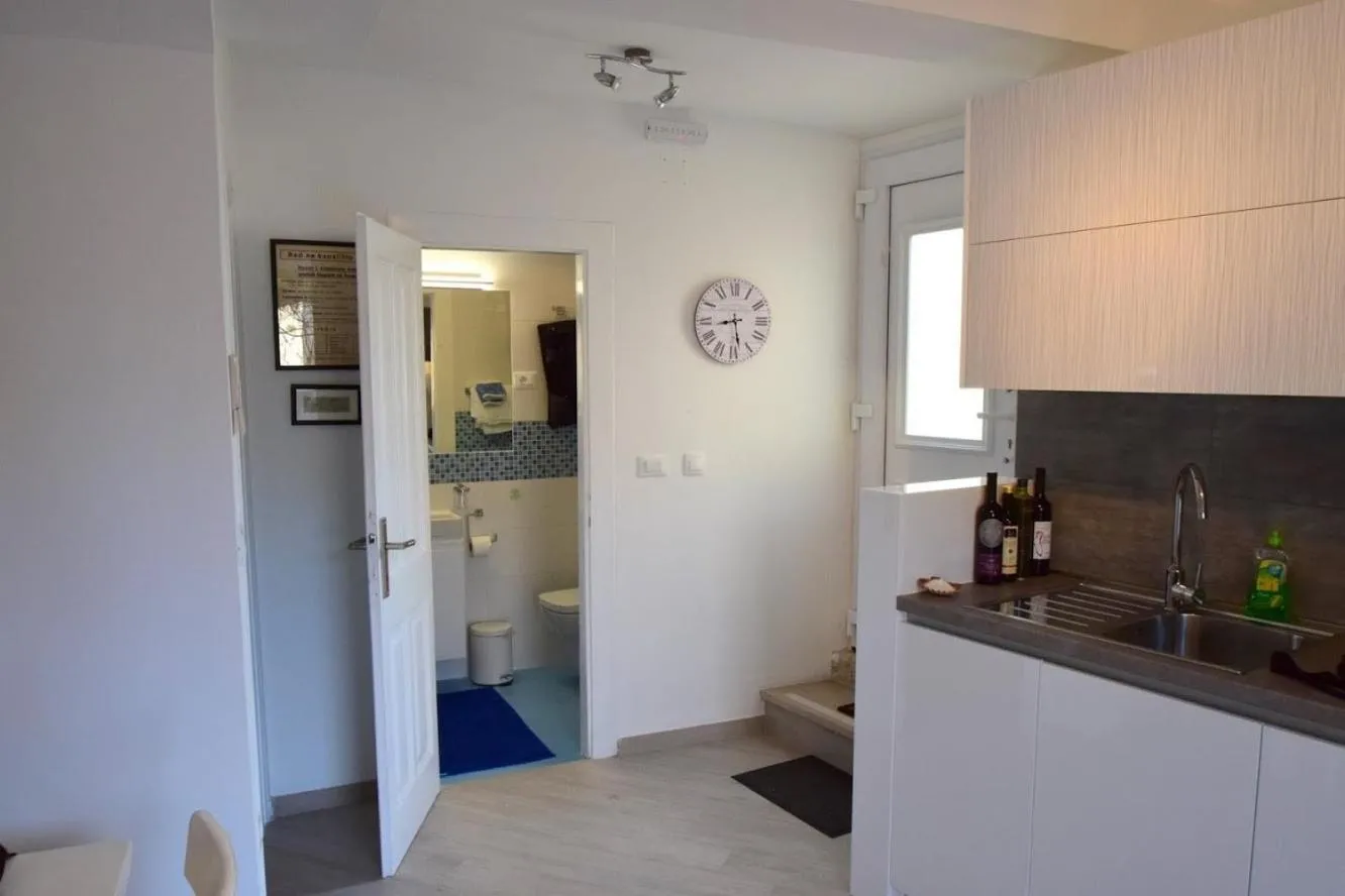 Kitchen or kitchenette in Apartment Šulić