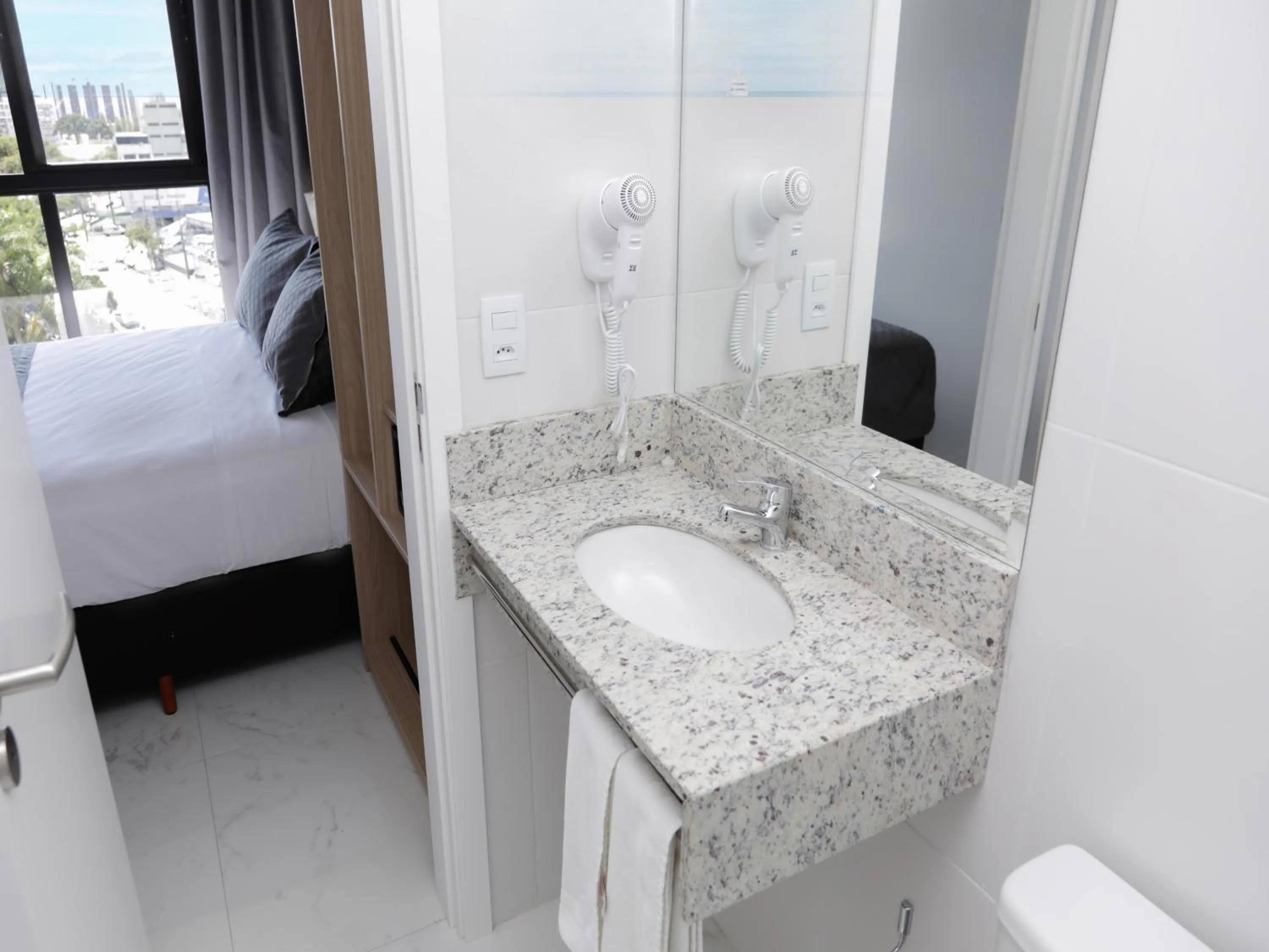 Photo of the whole room, Bed in Slim Curitiba João Bettega