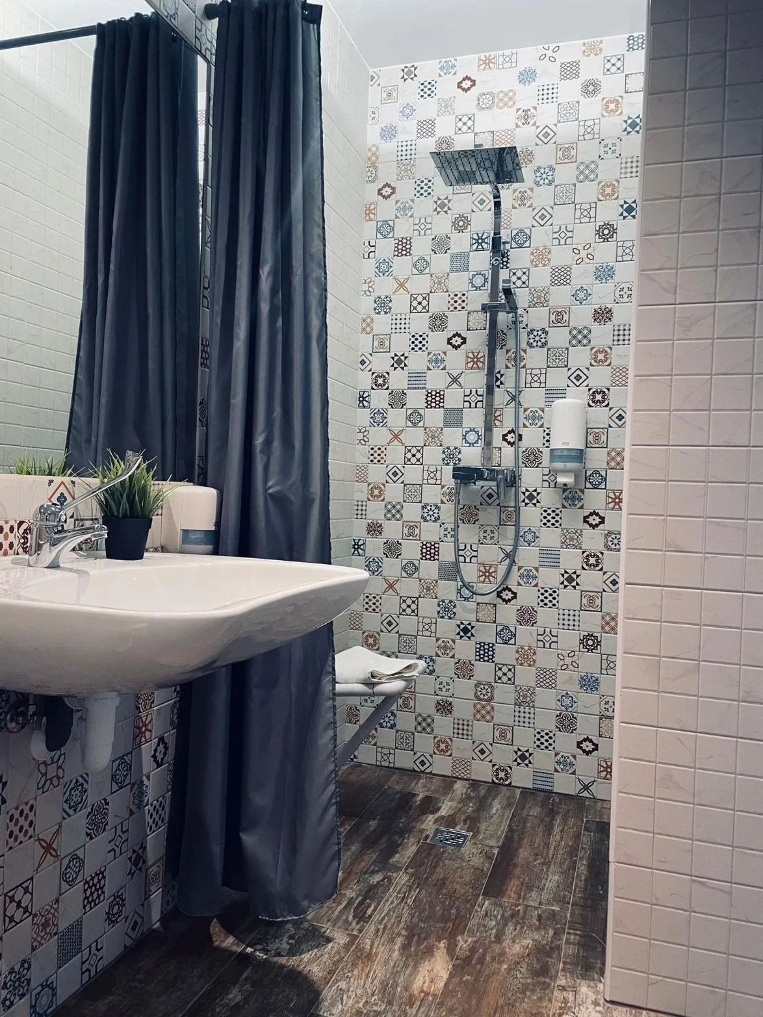 Bathroom in Hotel QB Almagro Centro