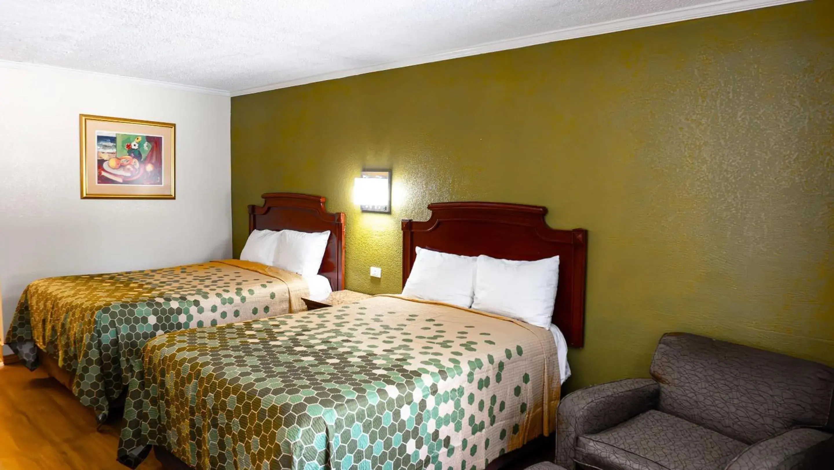 Bedroom, Bed in Rodeway Inn & Suites Fort Jackson Bedroom, Bed in Rodeway Inn & Suites Fort Jackson