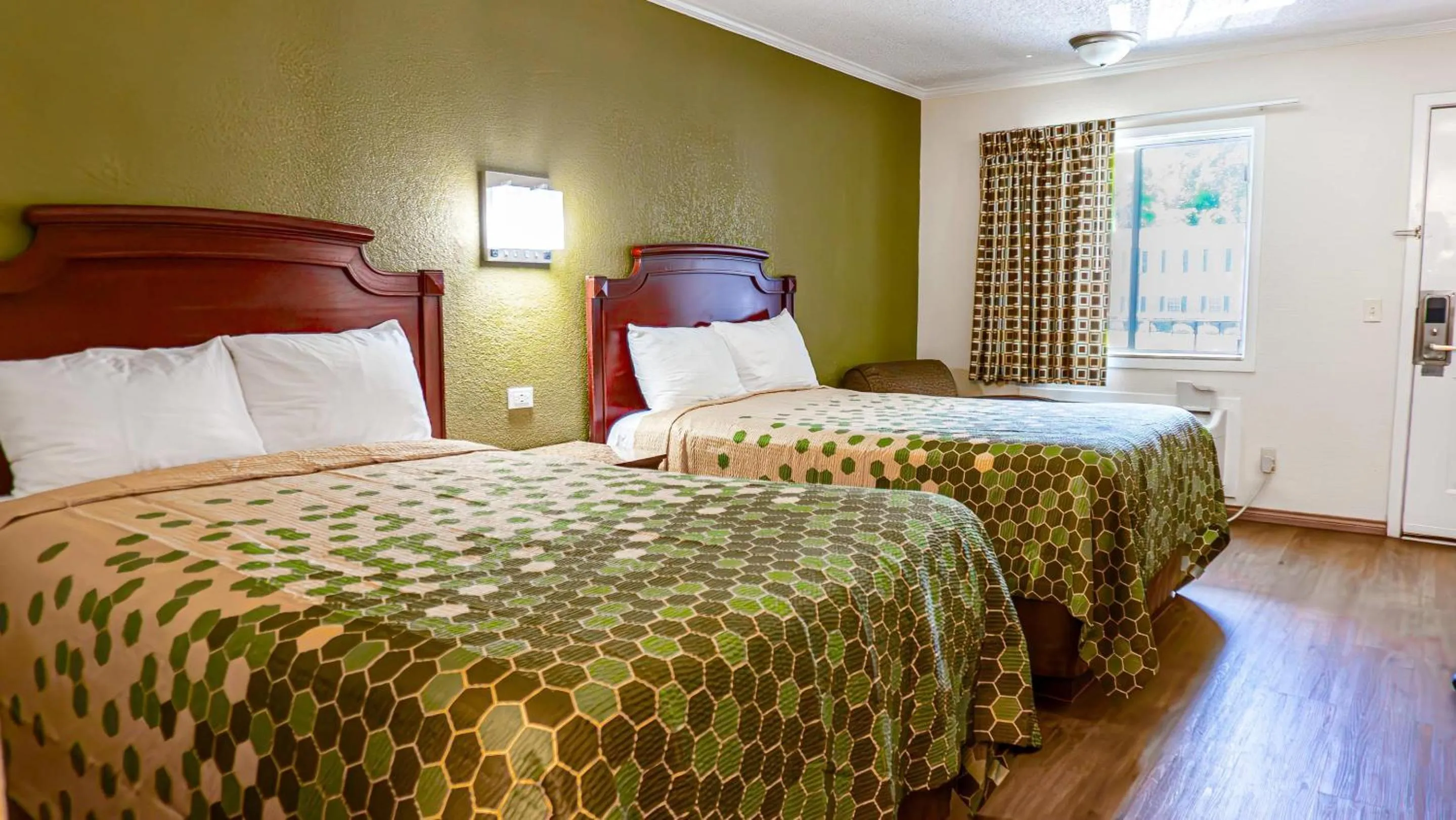 Bedroom, Bed in Rodeway Inn & Suites Fort Jackson