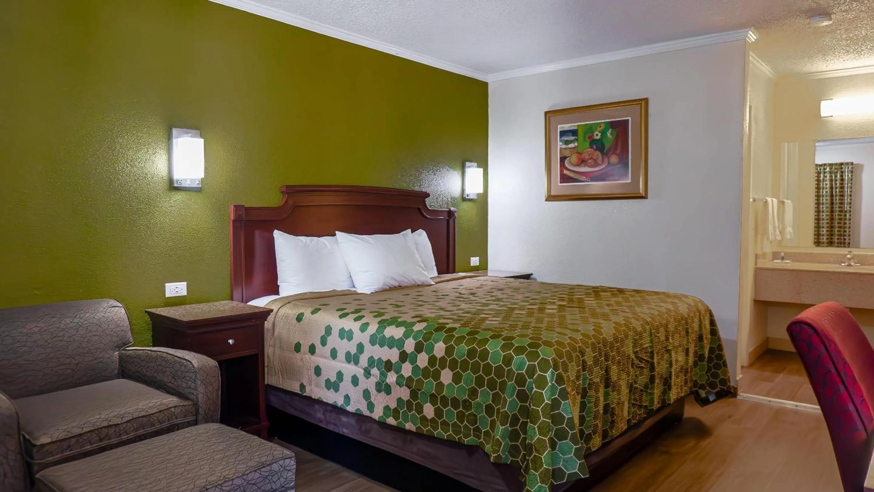 Bedroom, Bed in Rodeway Inn & Suites Fort Jackson