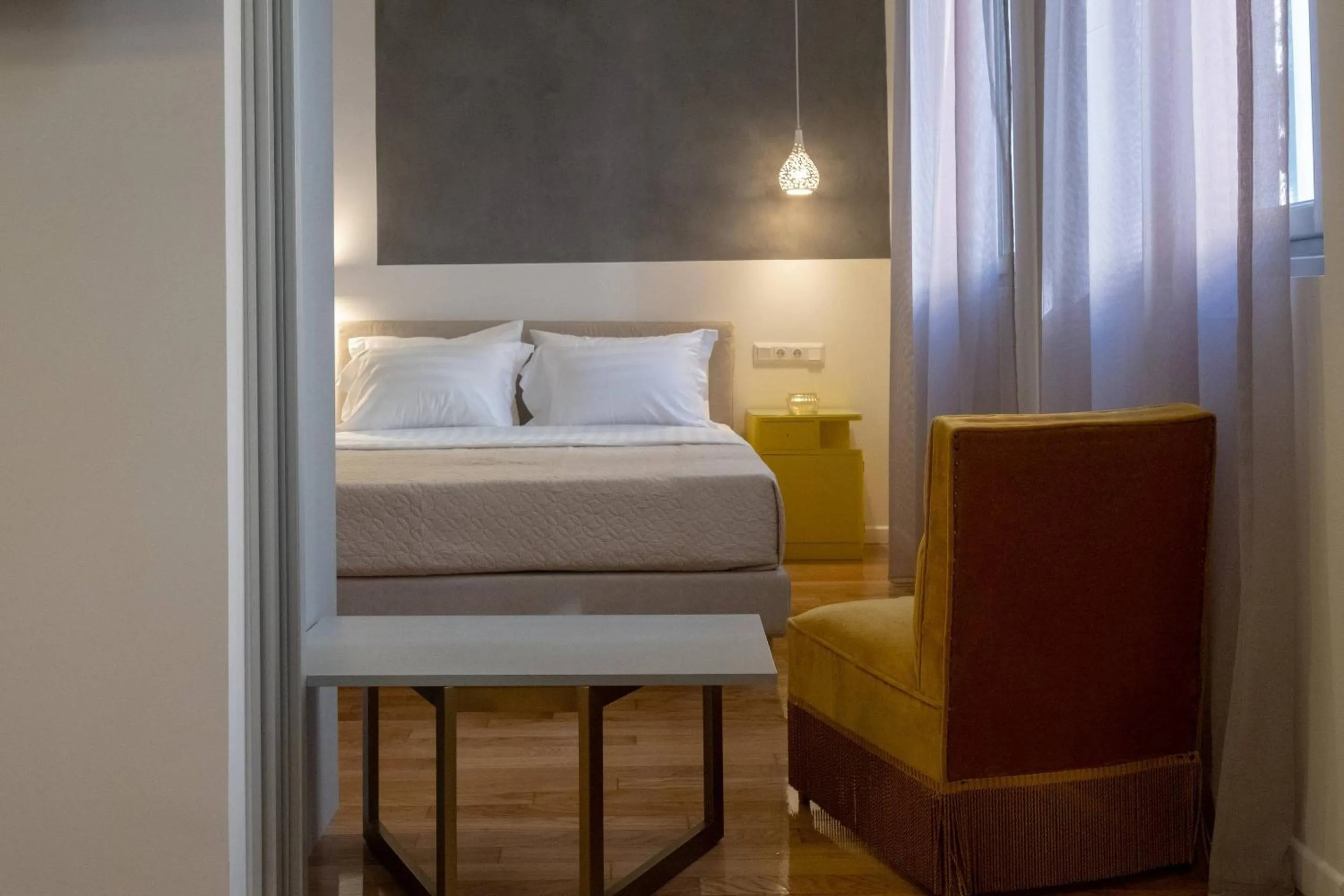Bed in ATHENIAN YARD SUITES