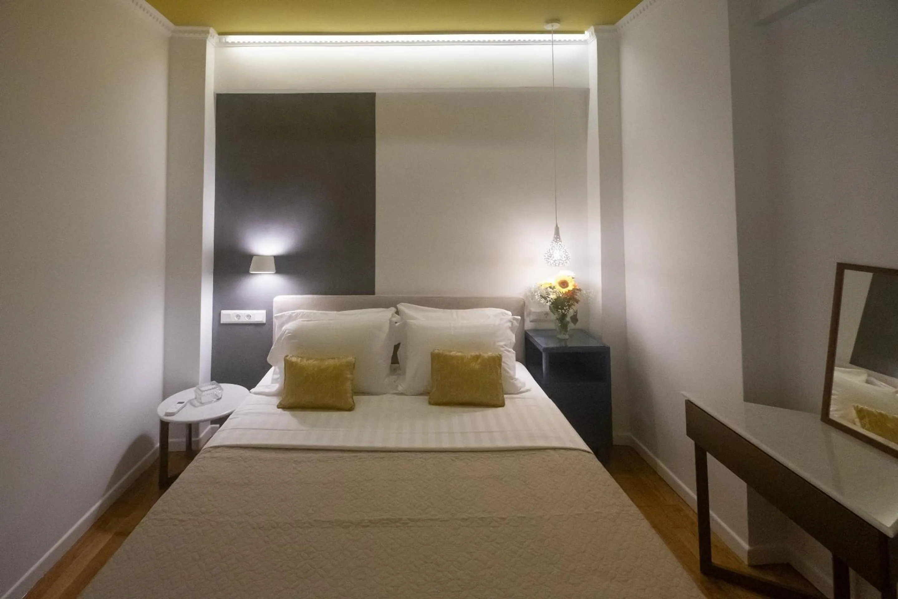 Bed in ATHENIAN YARD SUITES