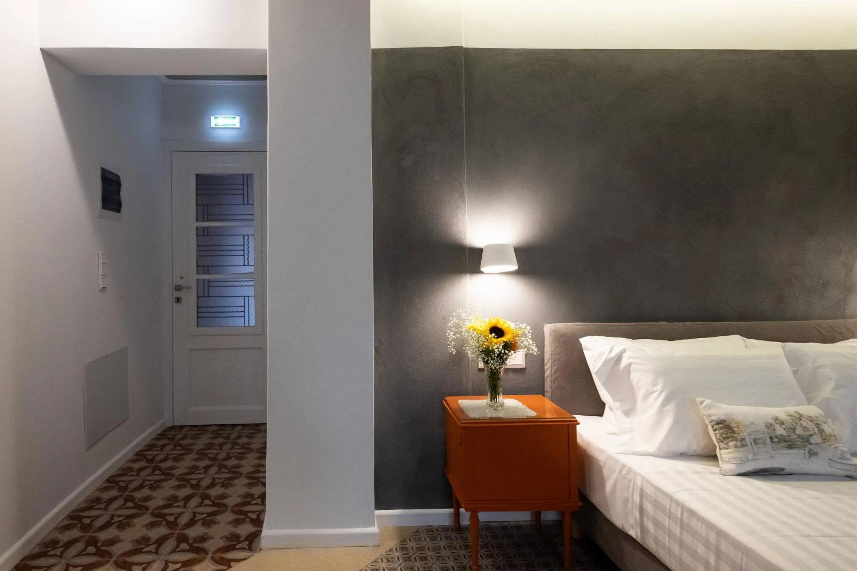 Bed in ATHENIAN YARD SUITES