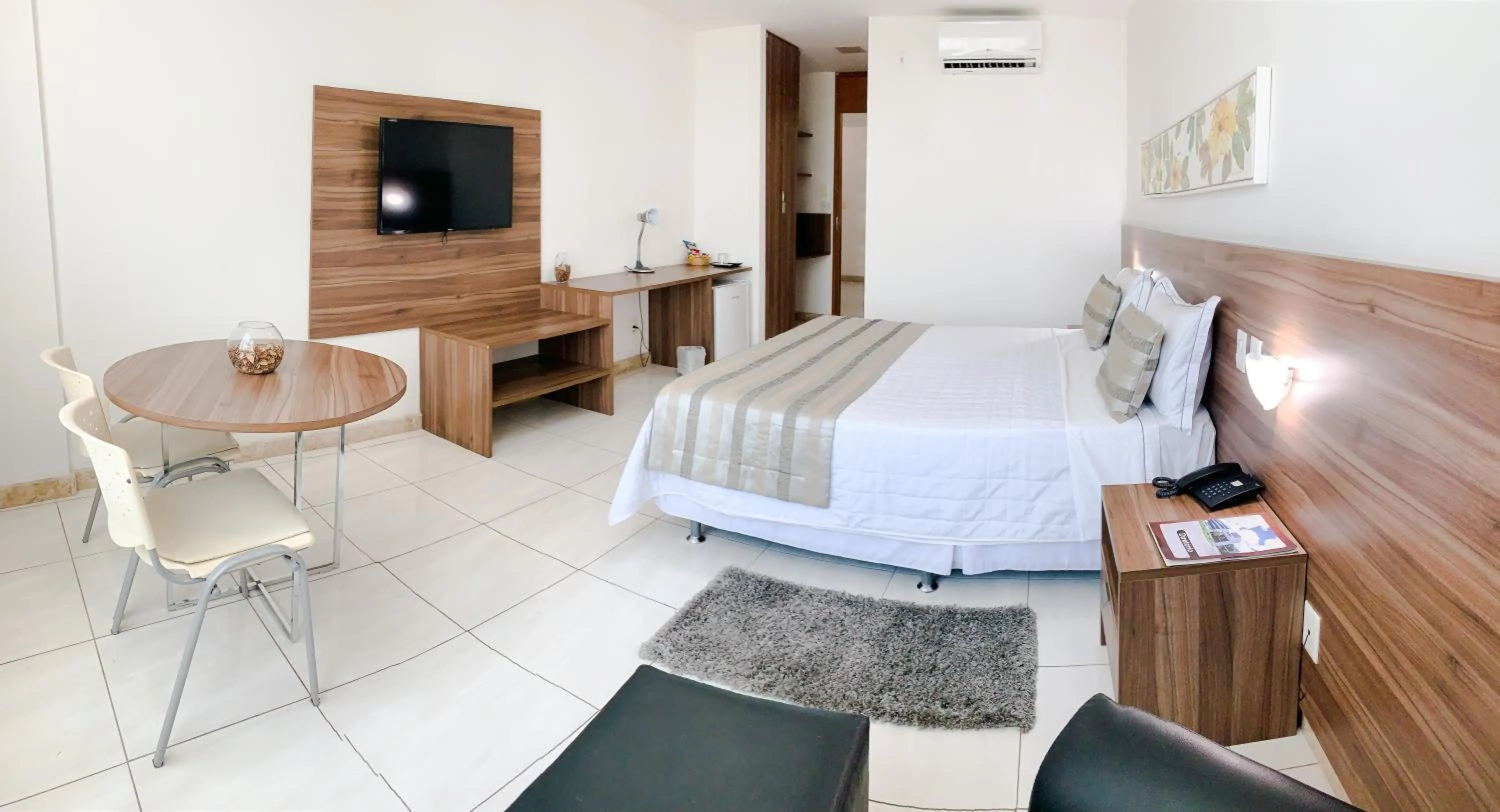 Bed in Cambuci Hotel