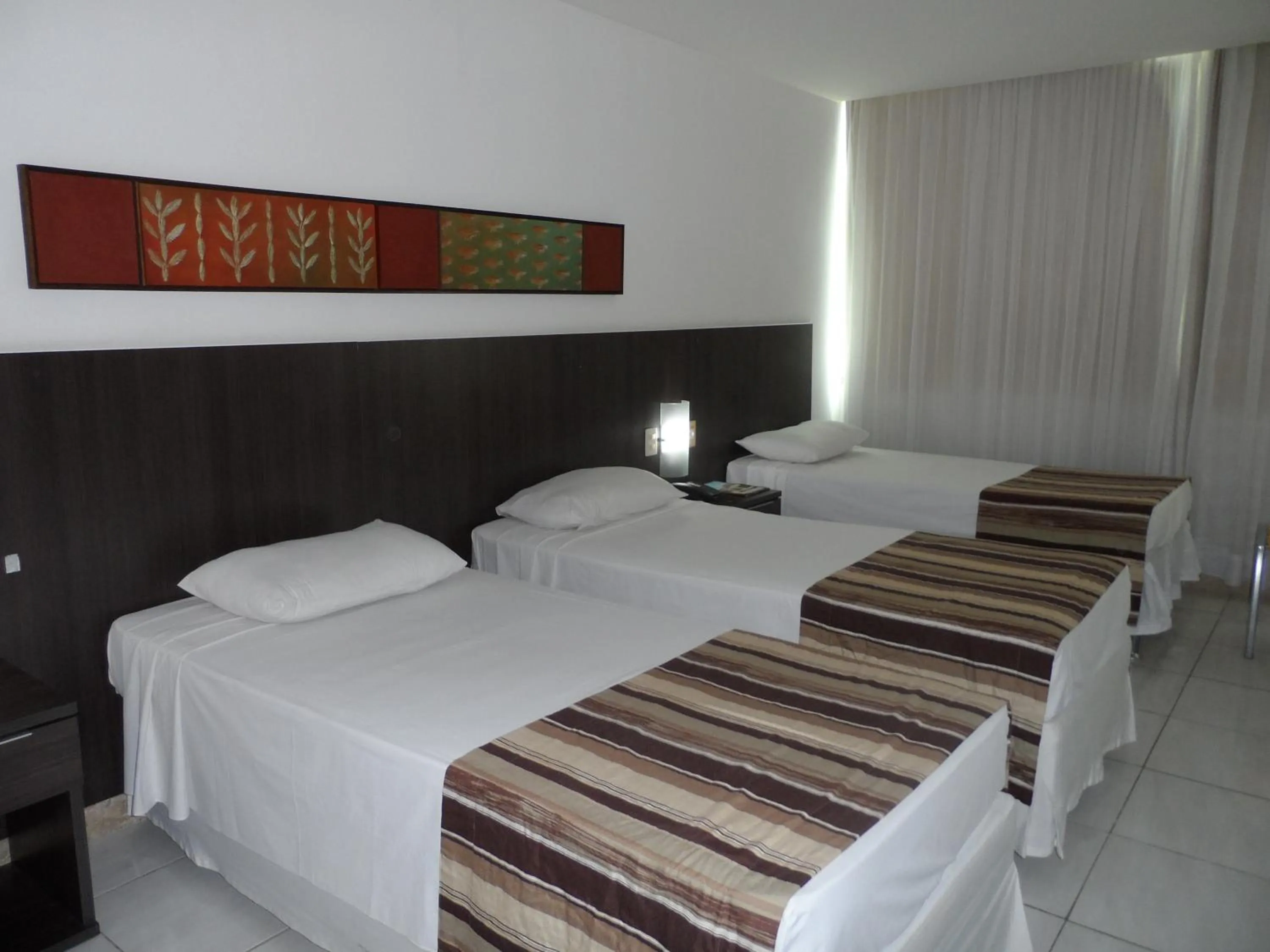 Photo of the whole room, Bed in Cambuci Hotel