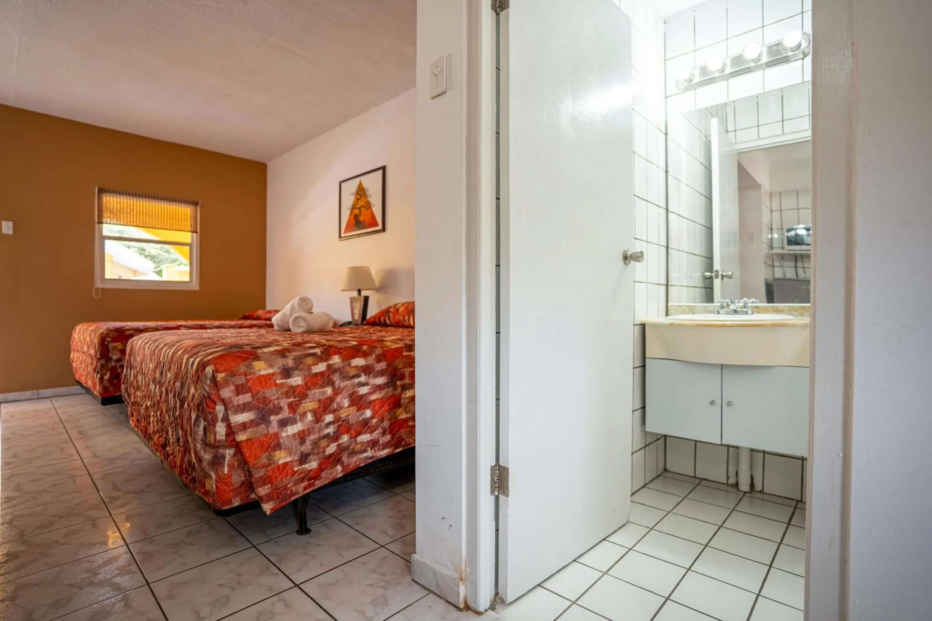 Photo of the whole room, Bed in Coconut Inn