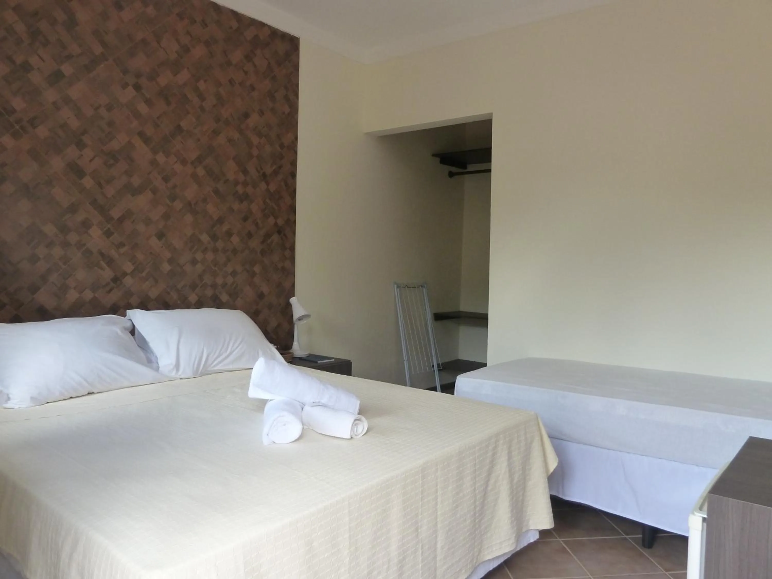 Bed in Pousada Canto Grande