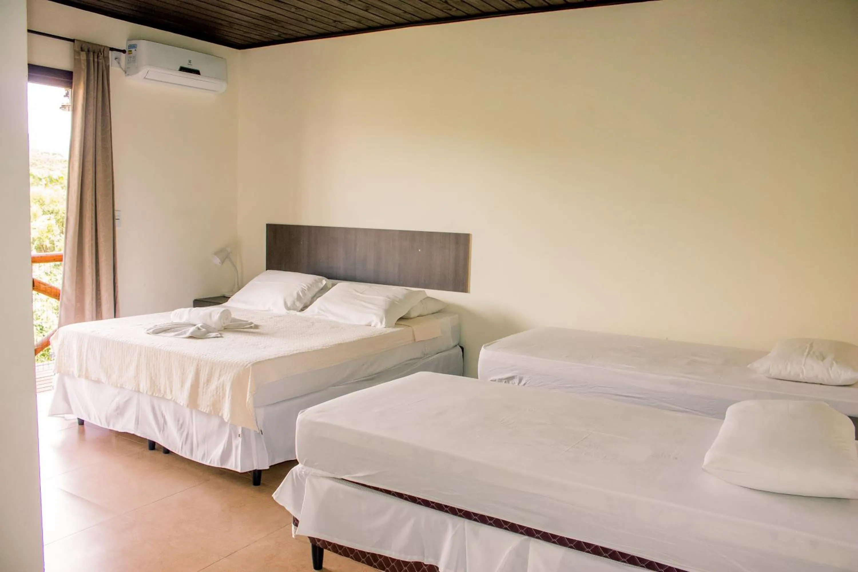 Bed in Pousada Canto Grande