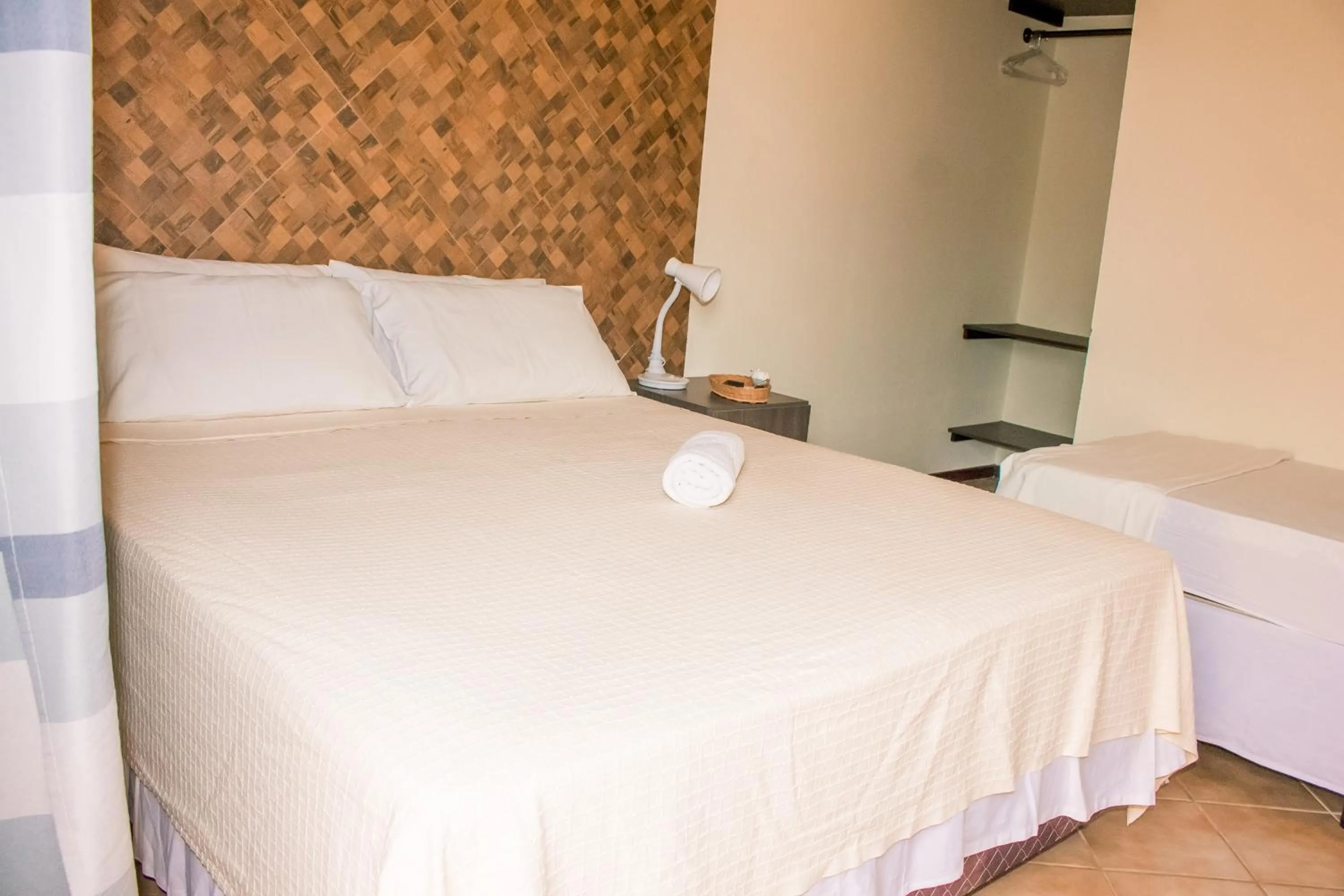 Bed in Pousada Canto Grande