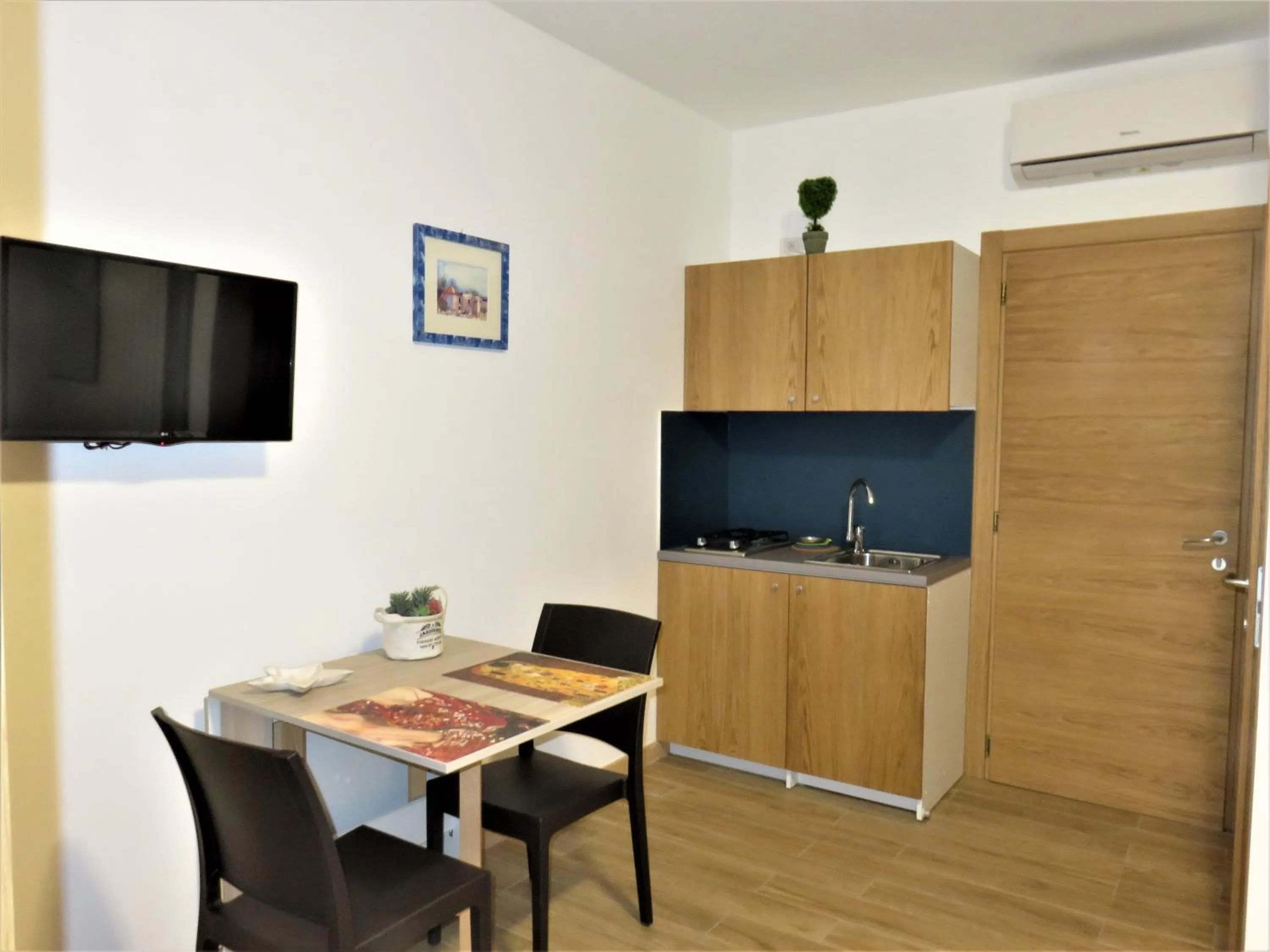 Kitchen or kitchenette in Residenza Montegrappa