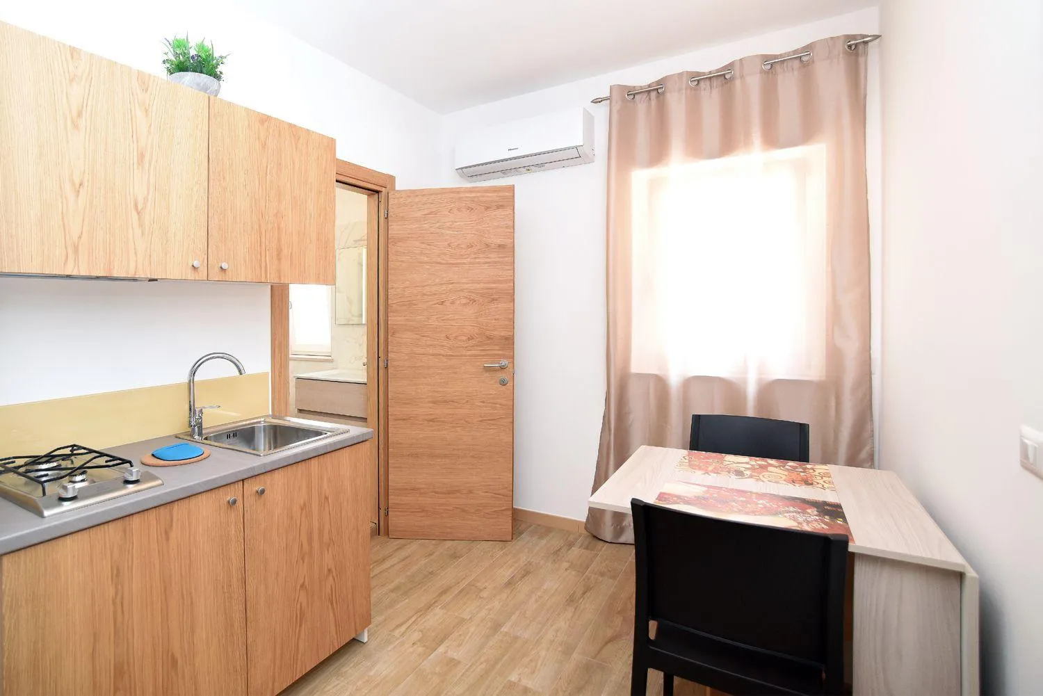 Kitchen or kitchenette in Residenza Montegrappa