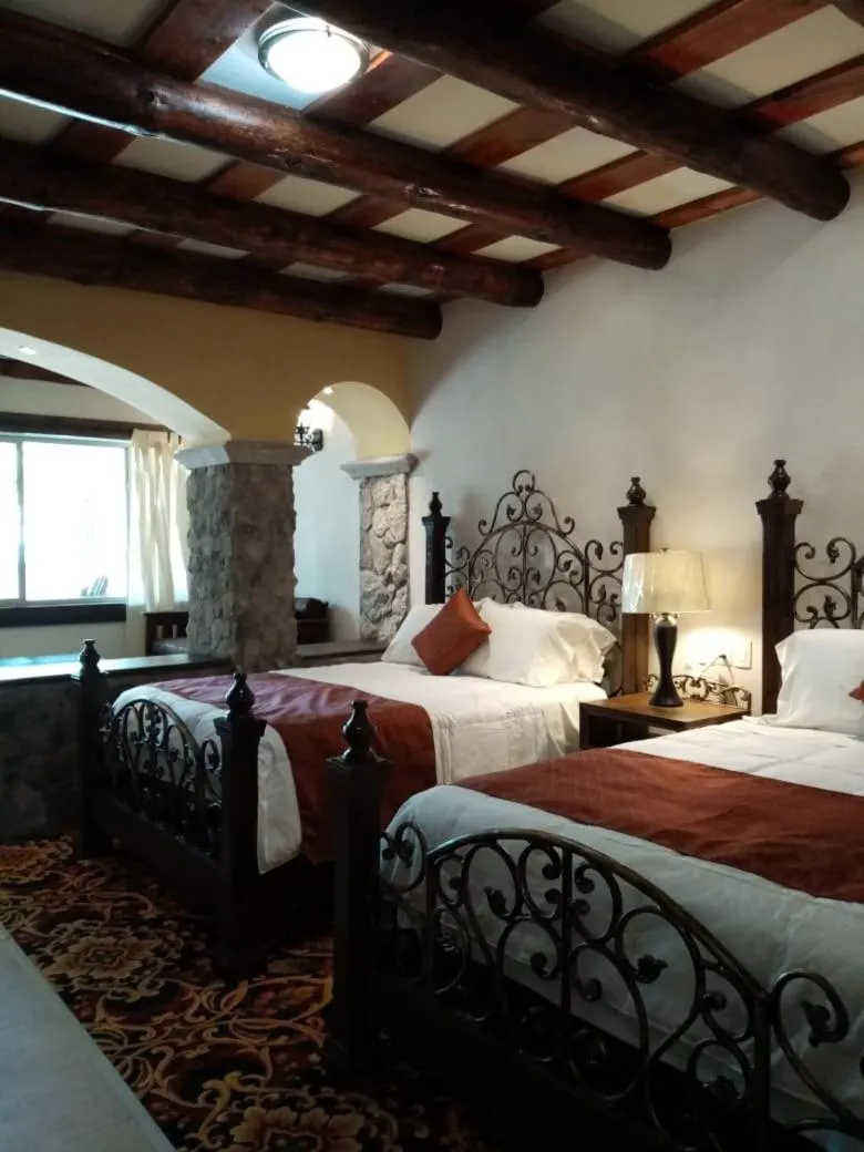 Photo of the whole room, Bed in Hotel Quinta Mision
