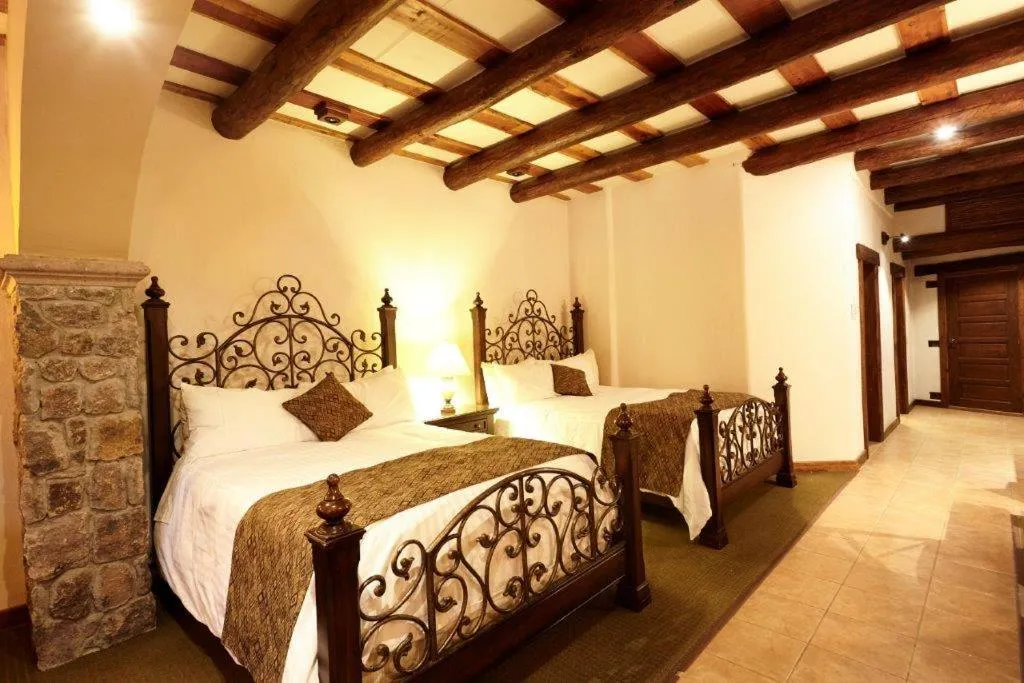 Photo of the whole room, Bed in Hotel Quinta Mision