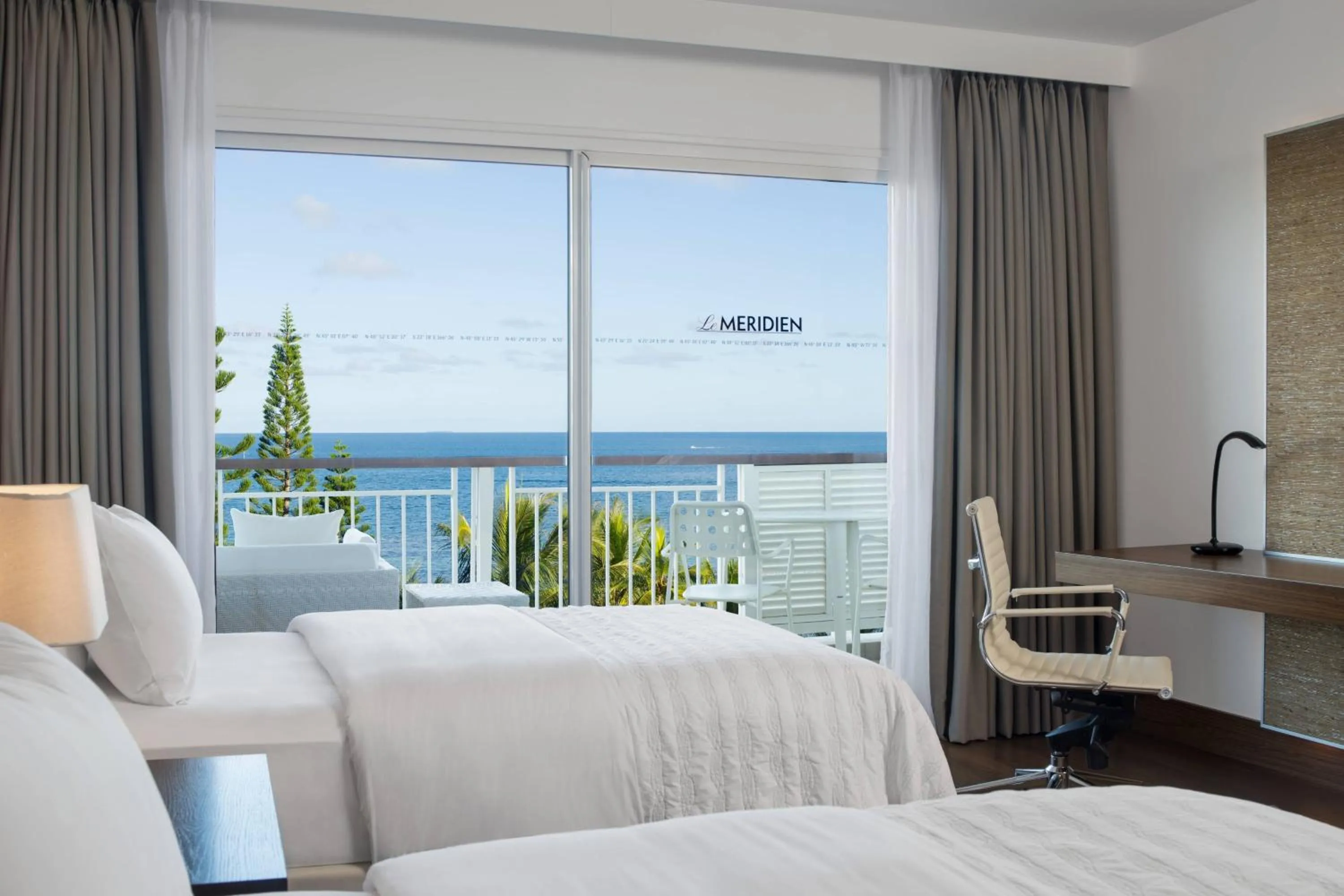 Photo of the whole room, Bed in Le Méridien Nouméa Resort & Spa