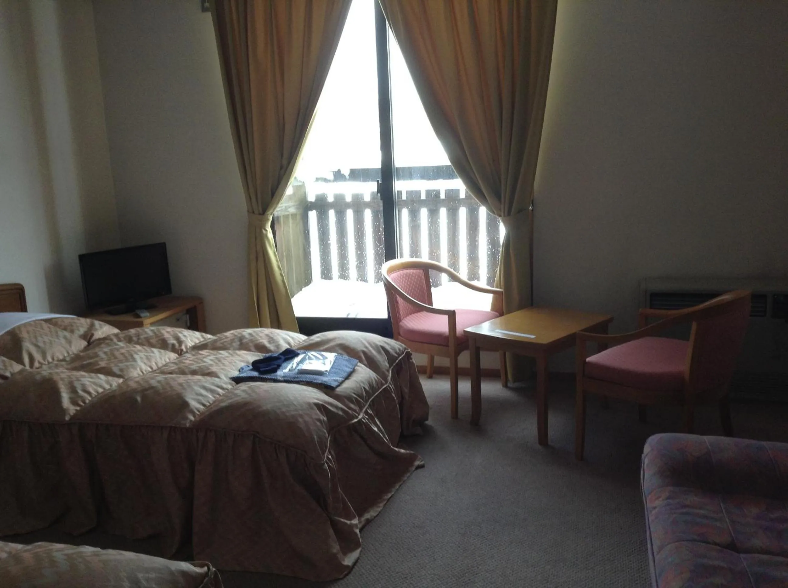 Bed in Hakuba Alpine Hotel