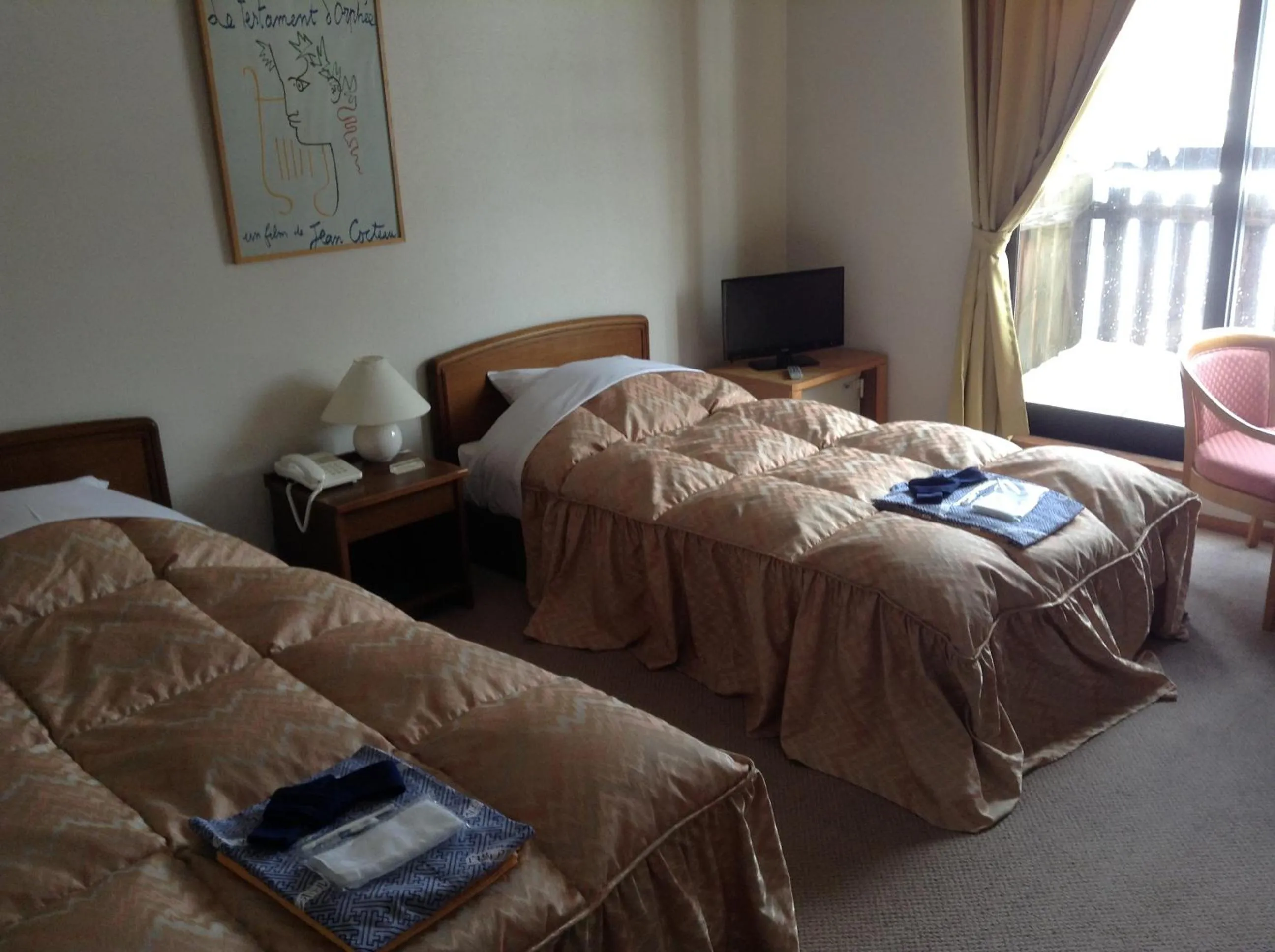Bed in Hakuba Alpine Hotel