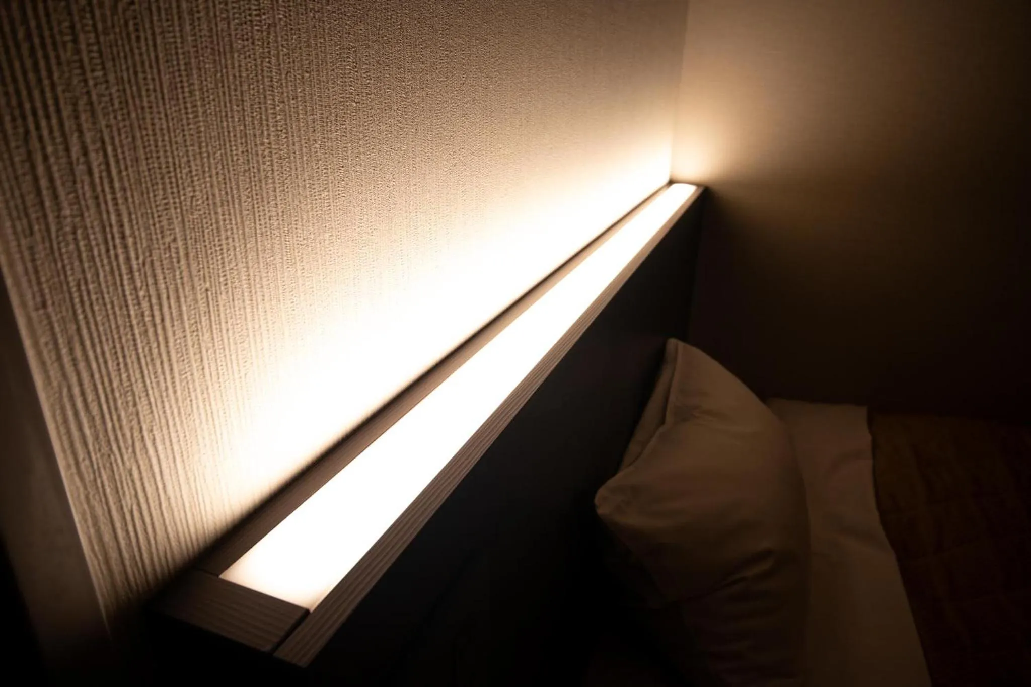 Bed in Hotel Sunroute Matsuyama