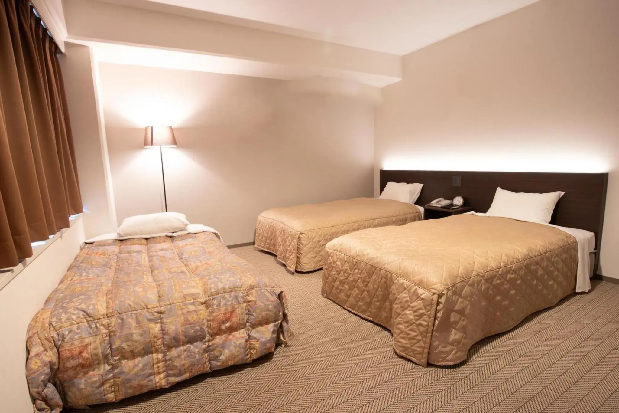 Bed in Hotel Sunroute Matsuyama Bed in Hotel Sunroute Matsuyama