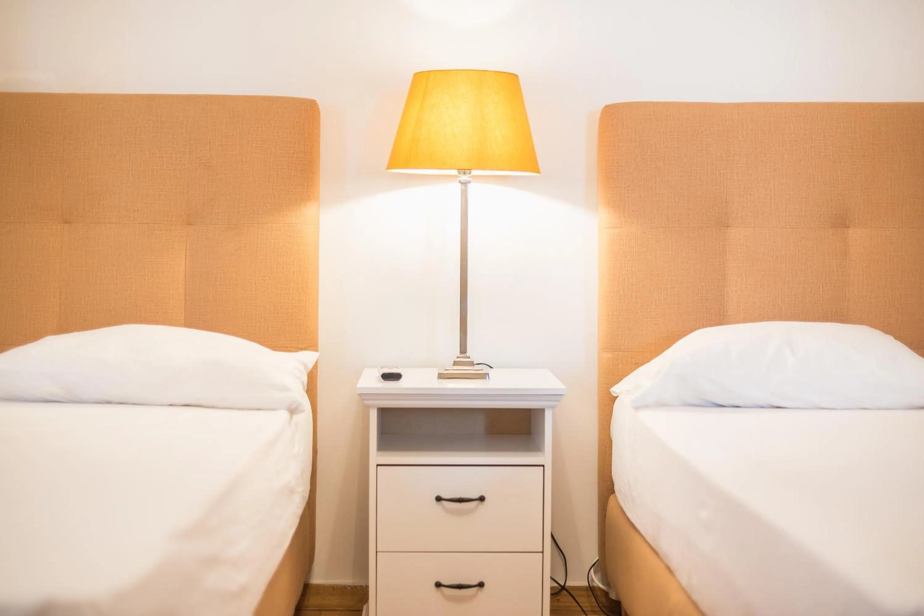 Bed in Athens Empire Paradise Apartment