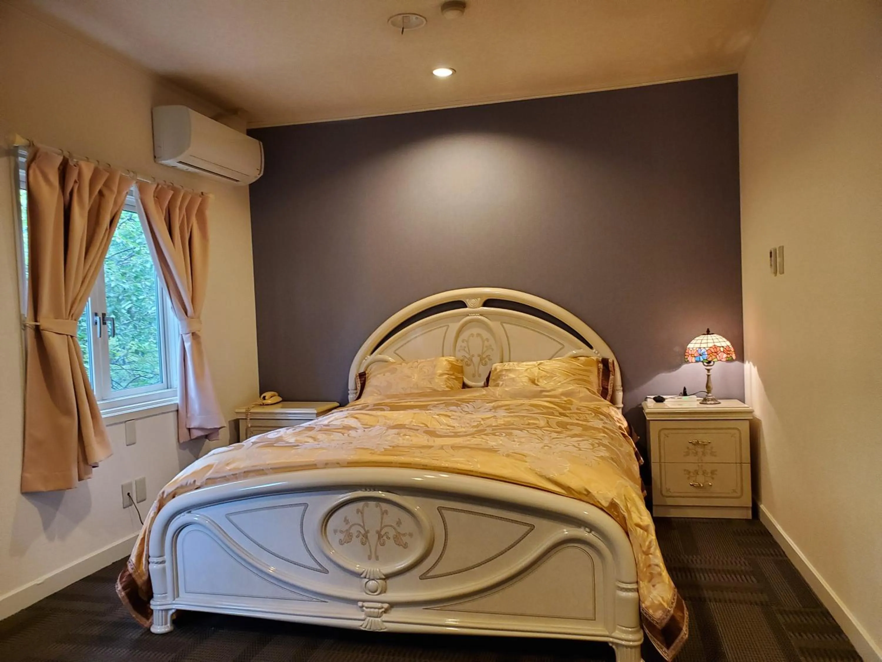 Bed in プチホテル葡萄屋