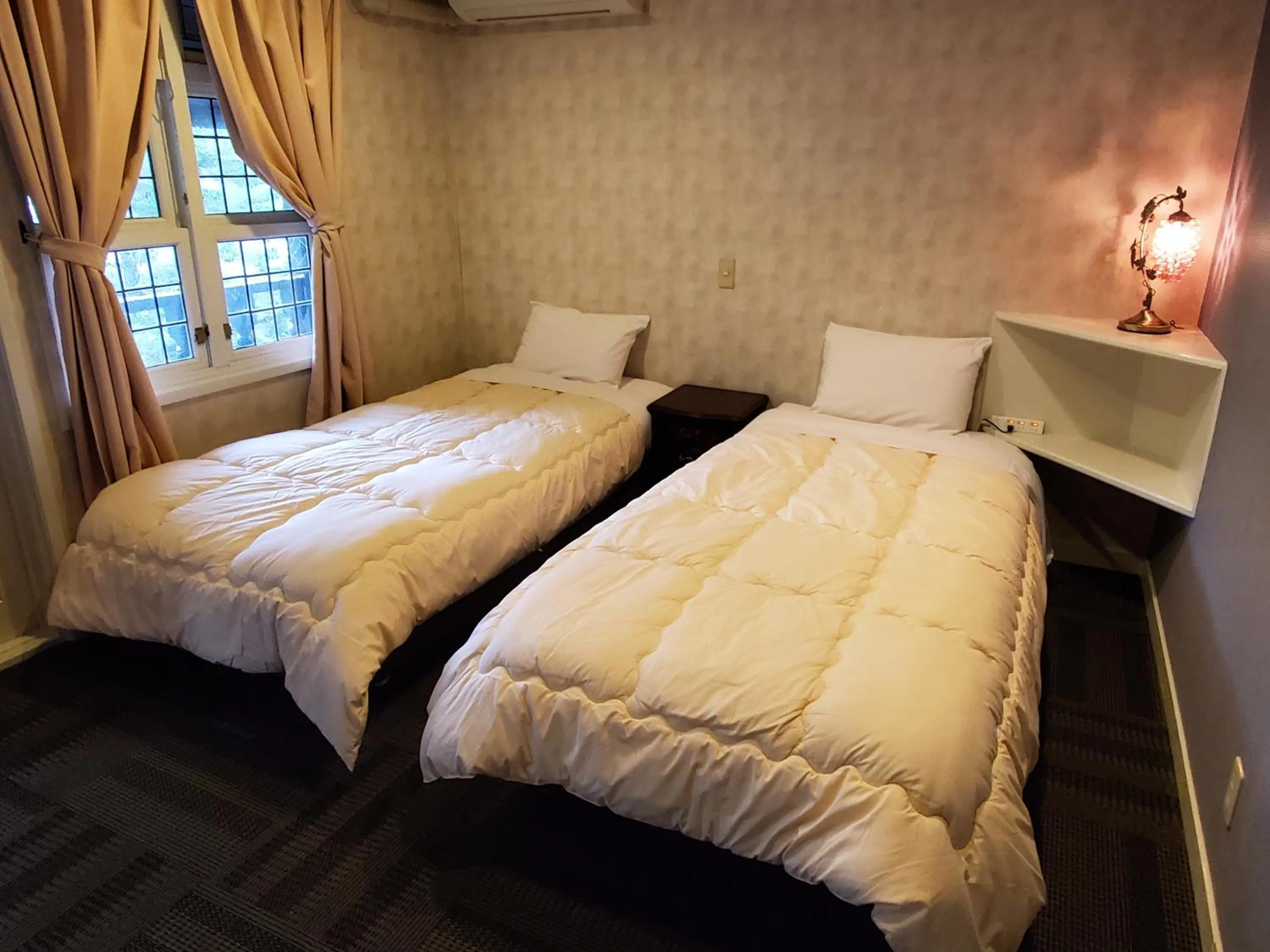 Bed in プチホテル葡萄屋