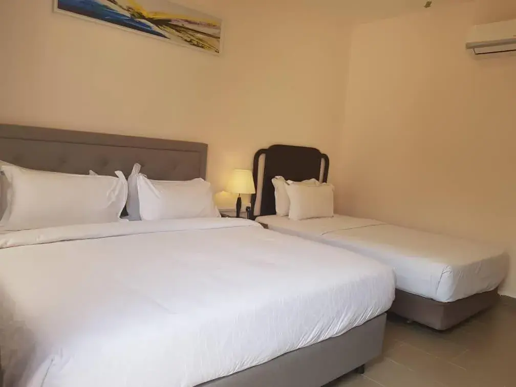 Bed in Lotus Seaview Beach Resort, Pengerang Bed in Lotus Seaview Beach Resort, Pengerang