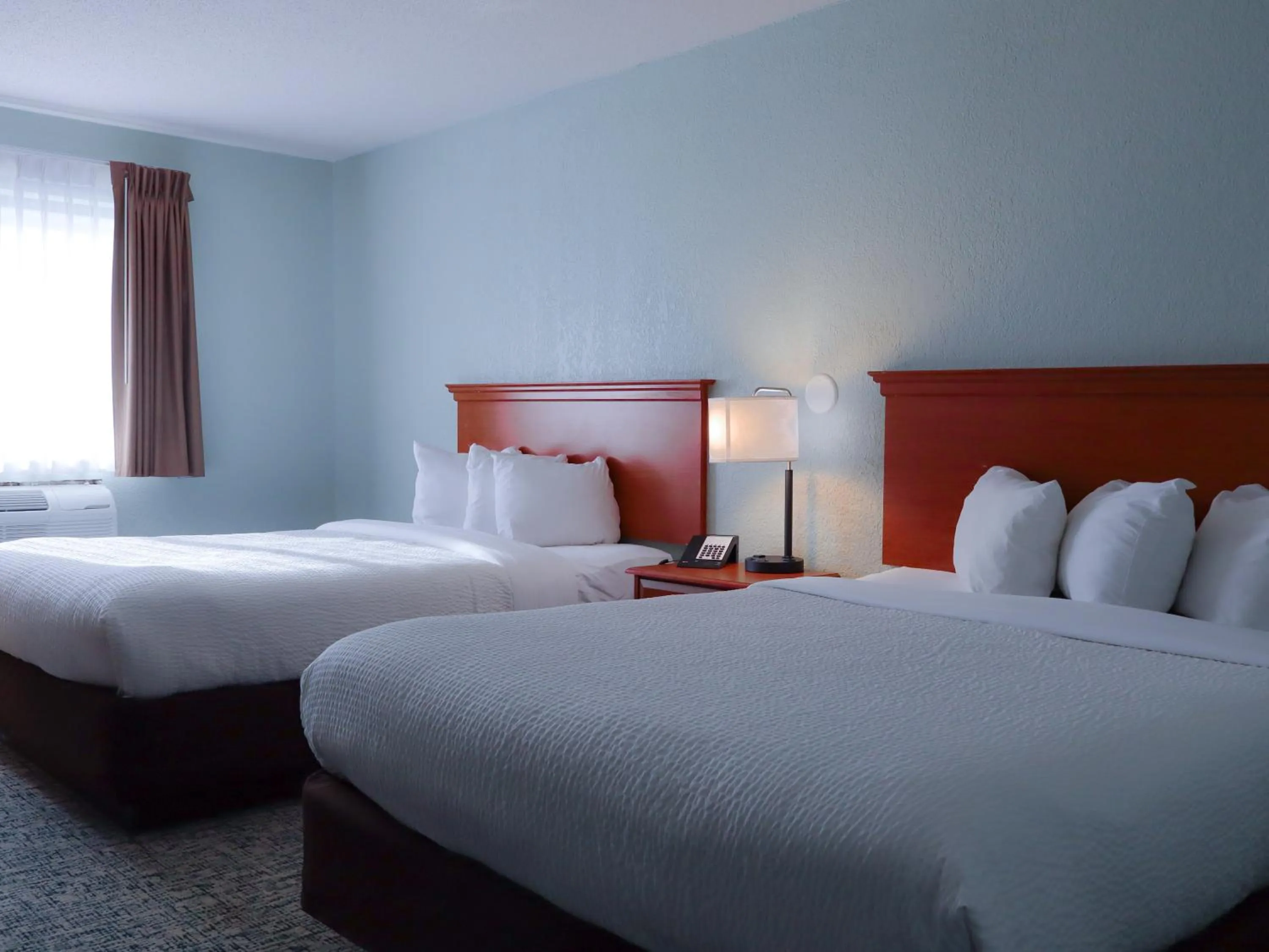 Bed in Travelodge by Wyndham Rapid City - Black Hills