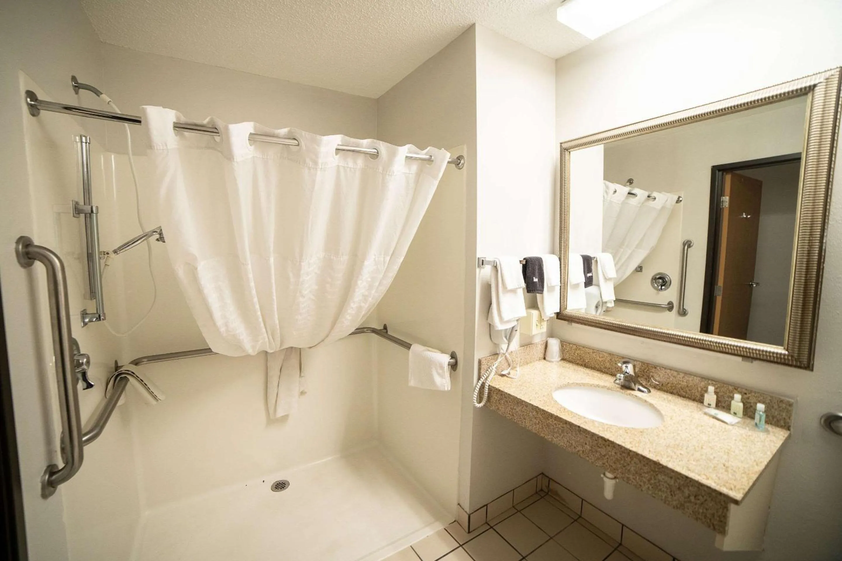 Bedroom in Quality Inn & Suites Watertown near Prairie Lakes Ice Arena