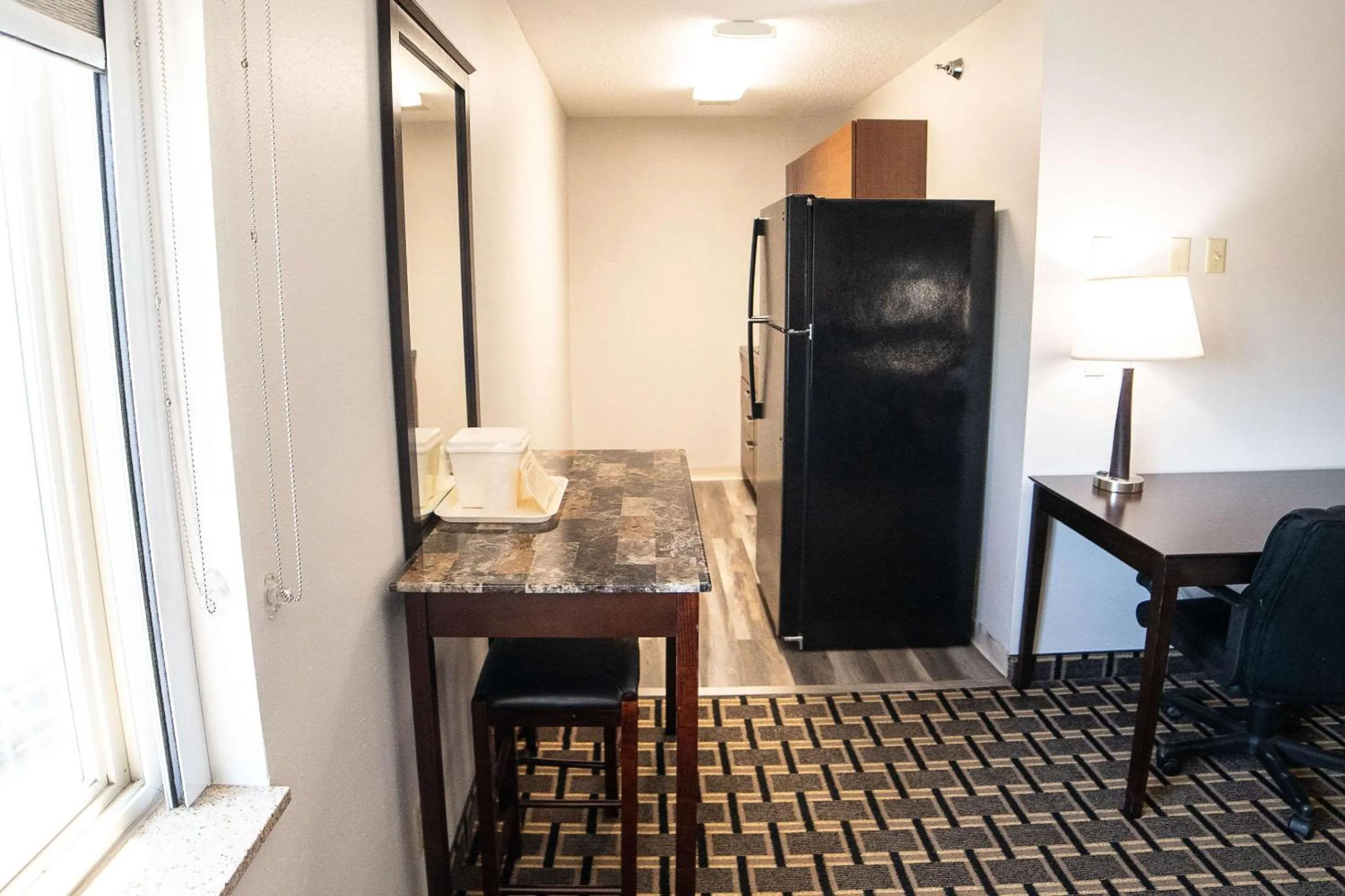 Bedroom in Quality Inn & Suites Watertown near Prairie Lakes Ice Arena