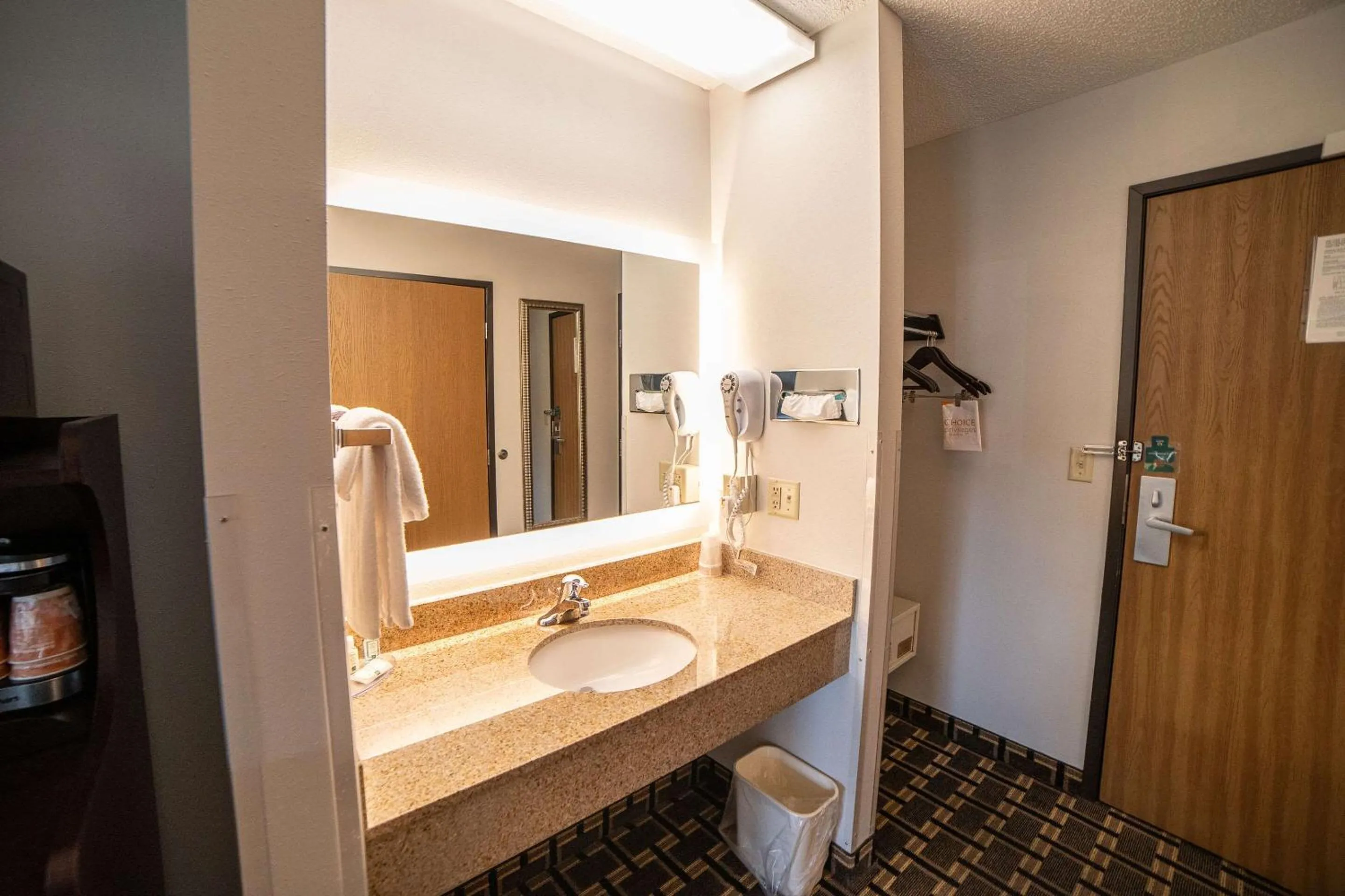 Bedroom in Quality Inn & Suites Watertown near Prairie Lakes Ice Arena