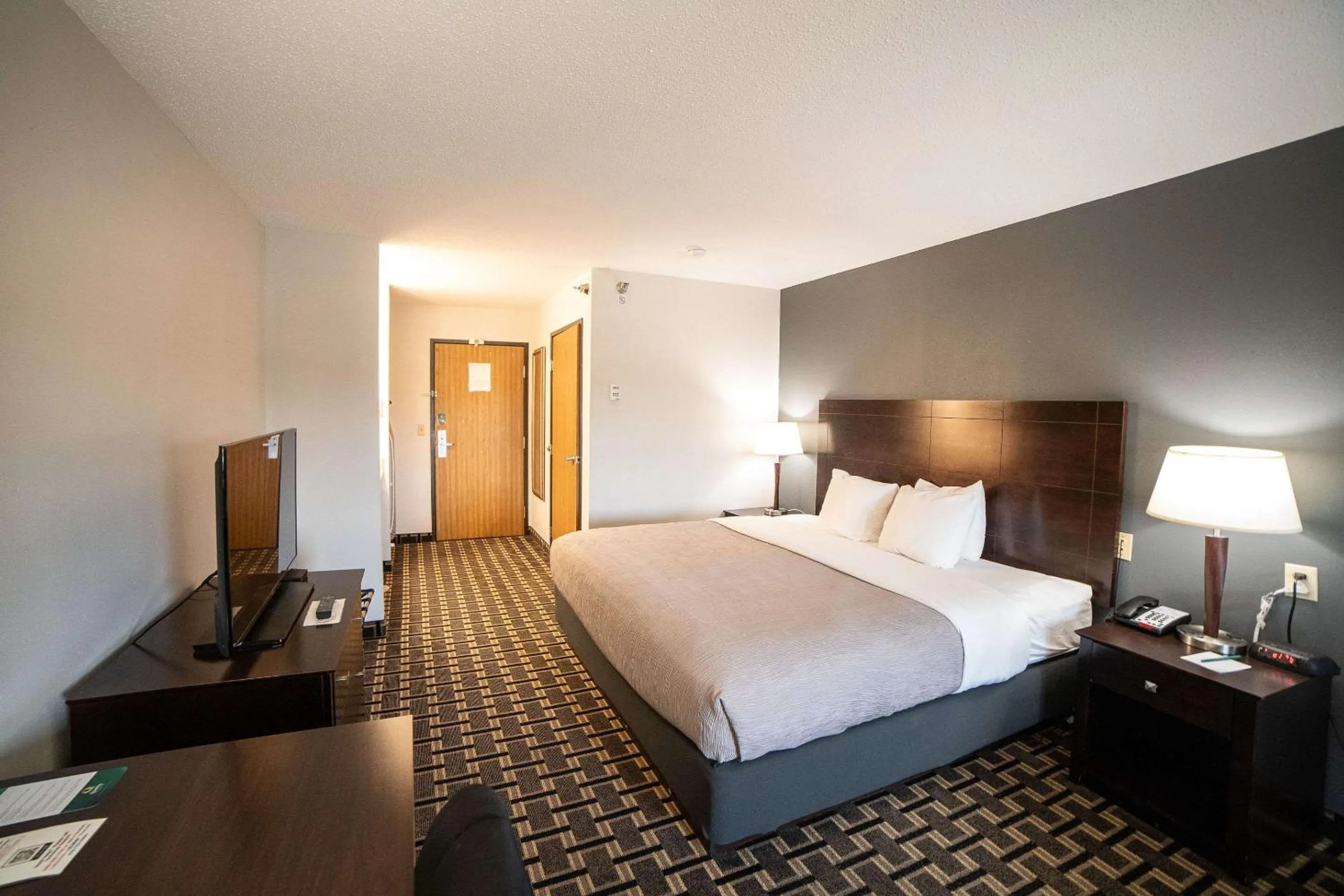 Bedroom, Bed in Quality Inn & Suites Watertown near Prairie Lakes Ice Arena