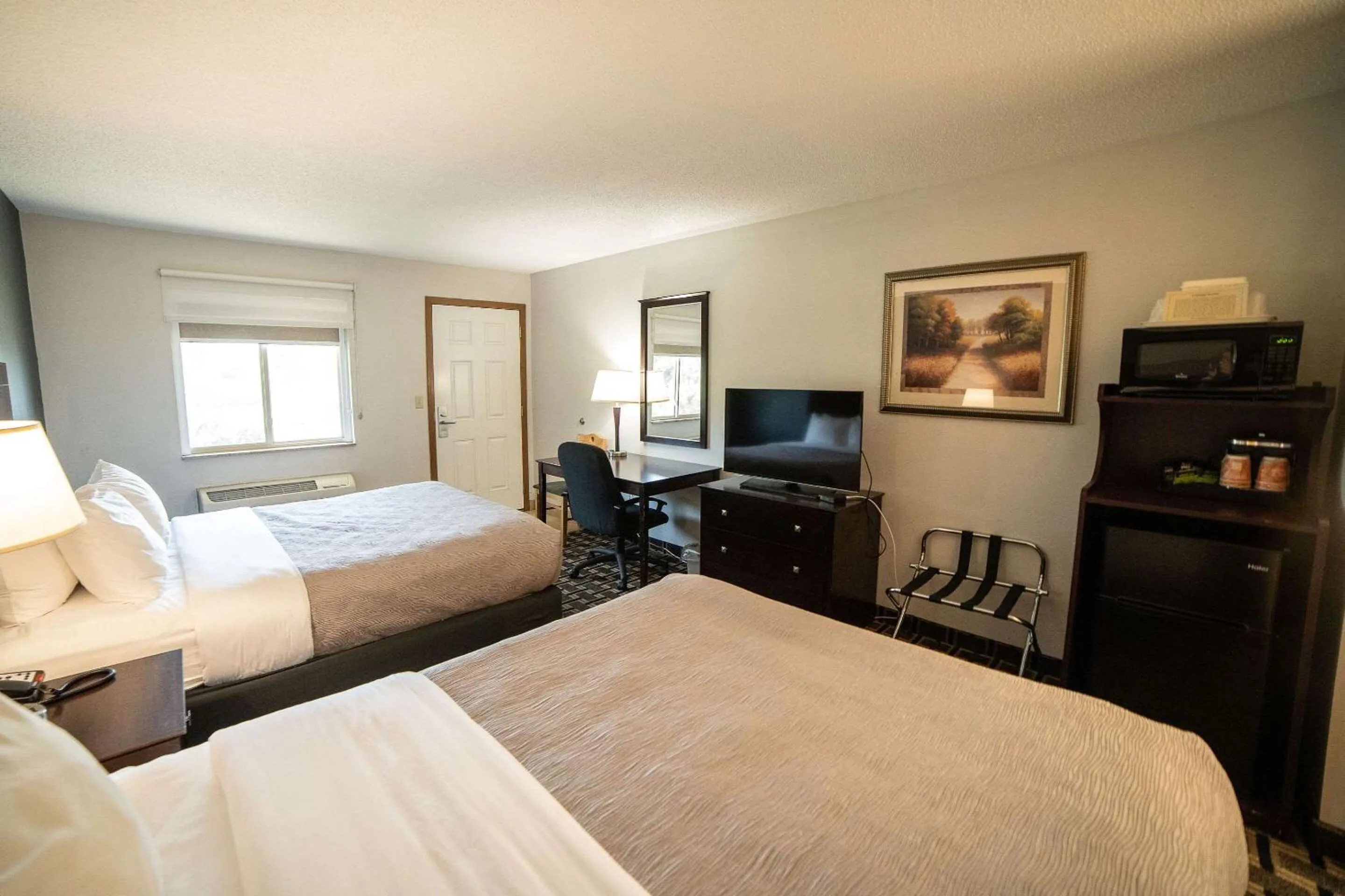 Bedroom, Bed in Quality Inn & Suites Watertown near Prairie Lakes Ice Arena