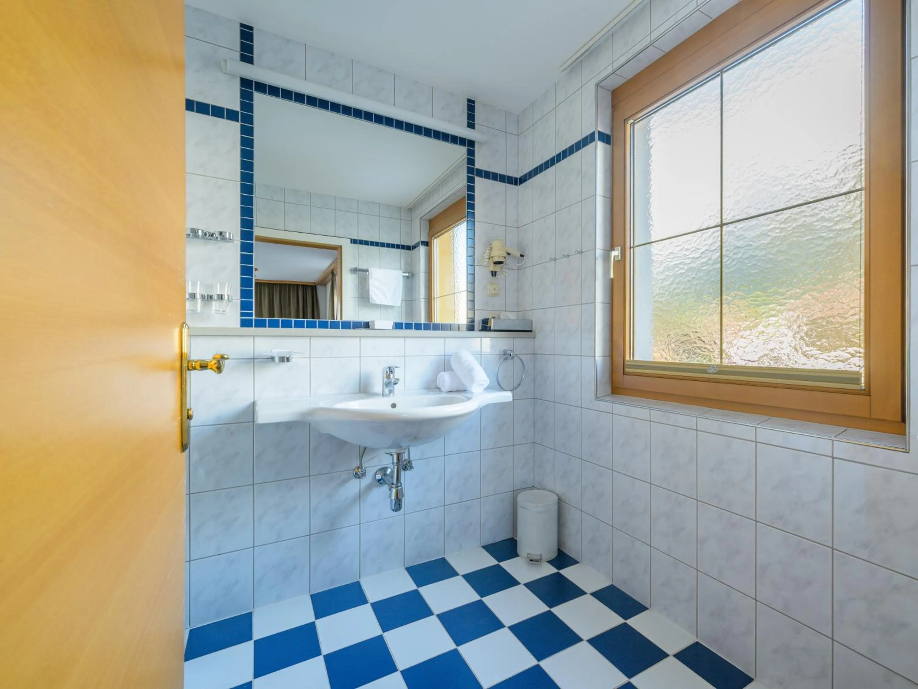 Bathroom in Landgasthof Bogner by SMK Event und Gastro