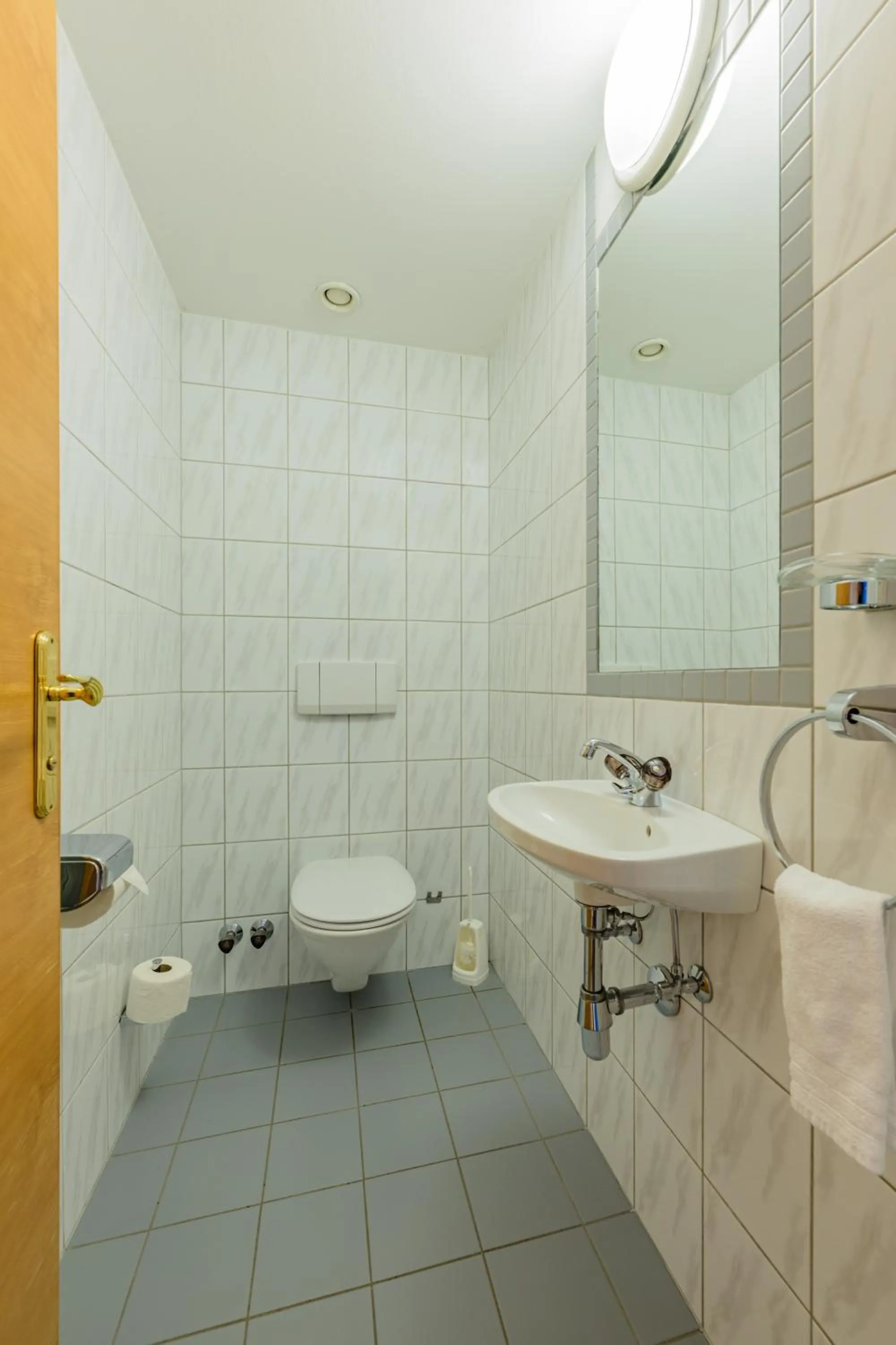 Bathroom in Landgasthof Bogner by SMK Event und Gastro