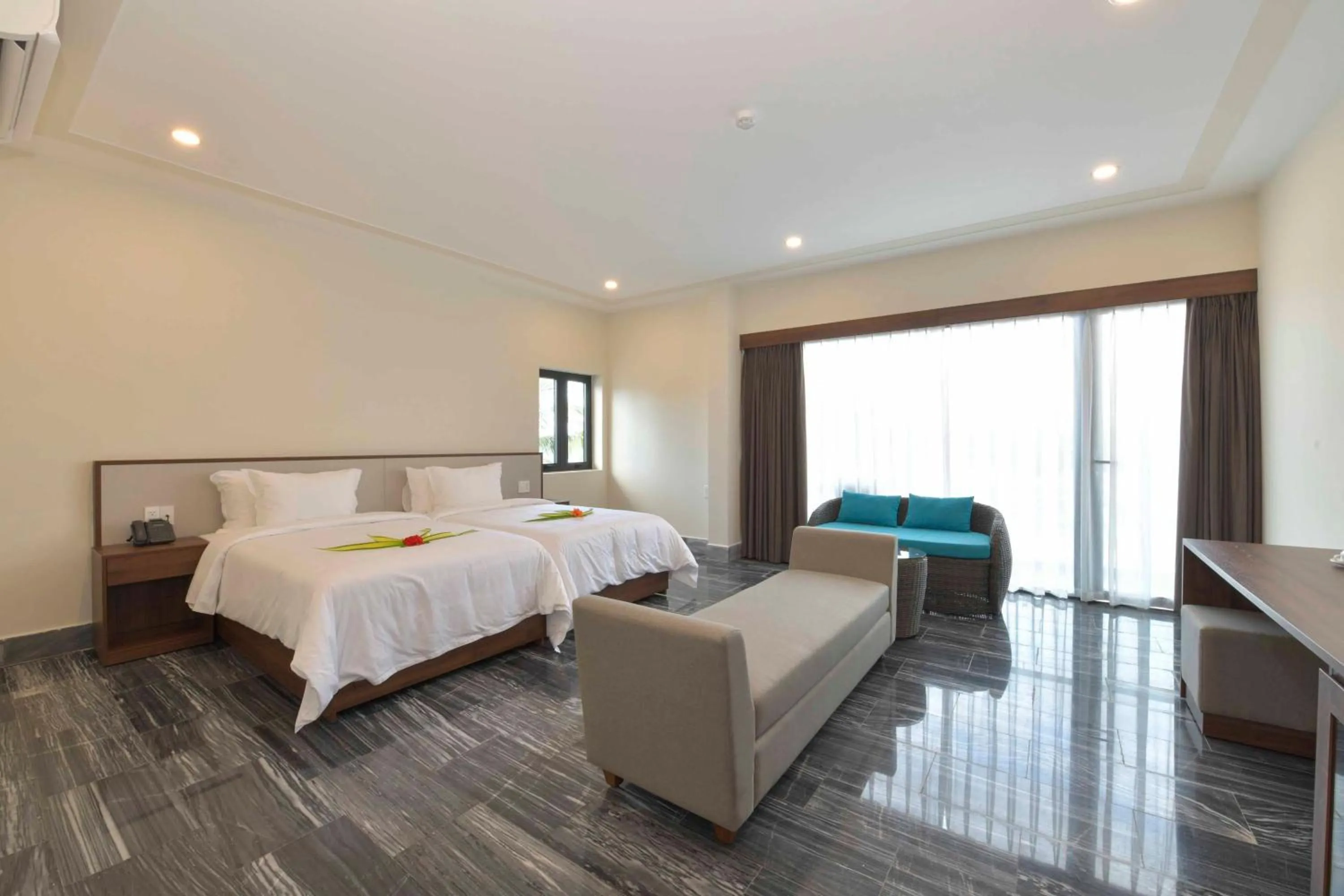 Bed in CocoLand Thu Xa Ancient Town Resort