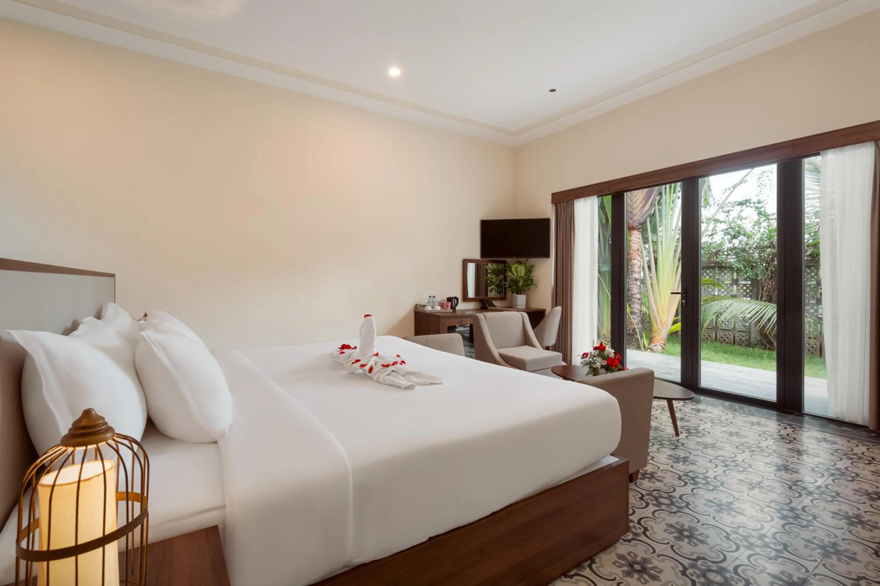 Photo of the whole room, Bed in CocoLand Thu Xa Ancient Town Hotel & Resort